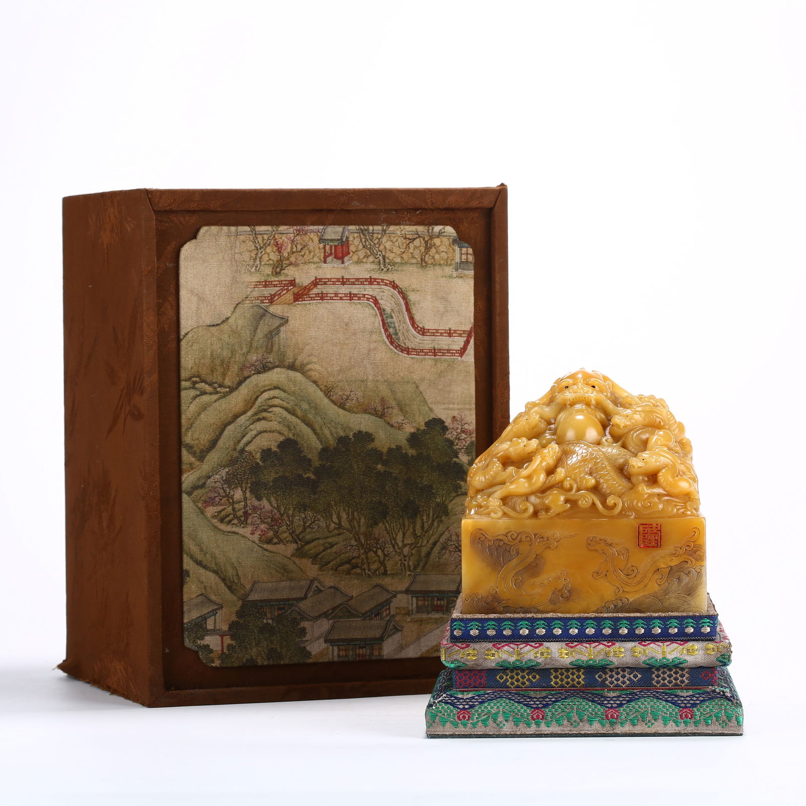 A SHOUSHAN TIANHUANG STONE SEAL WITH DRAGON KNOB: Shoushan Tianhuang stone seal with dragon knob