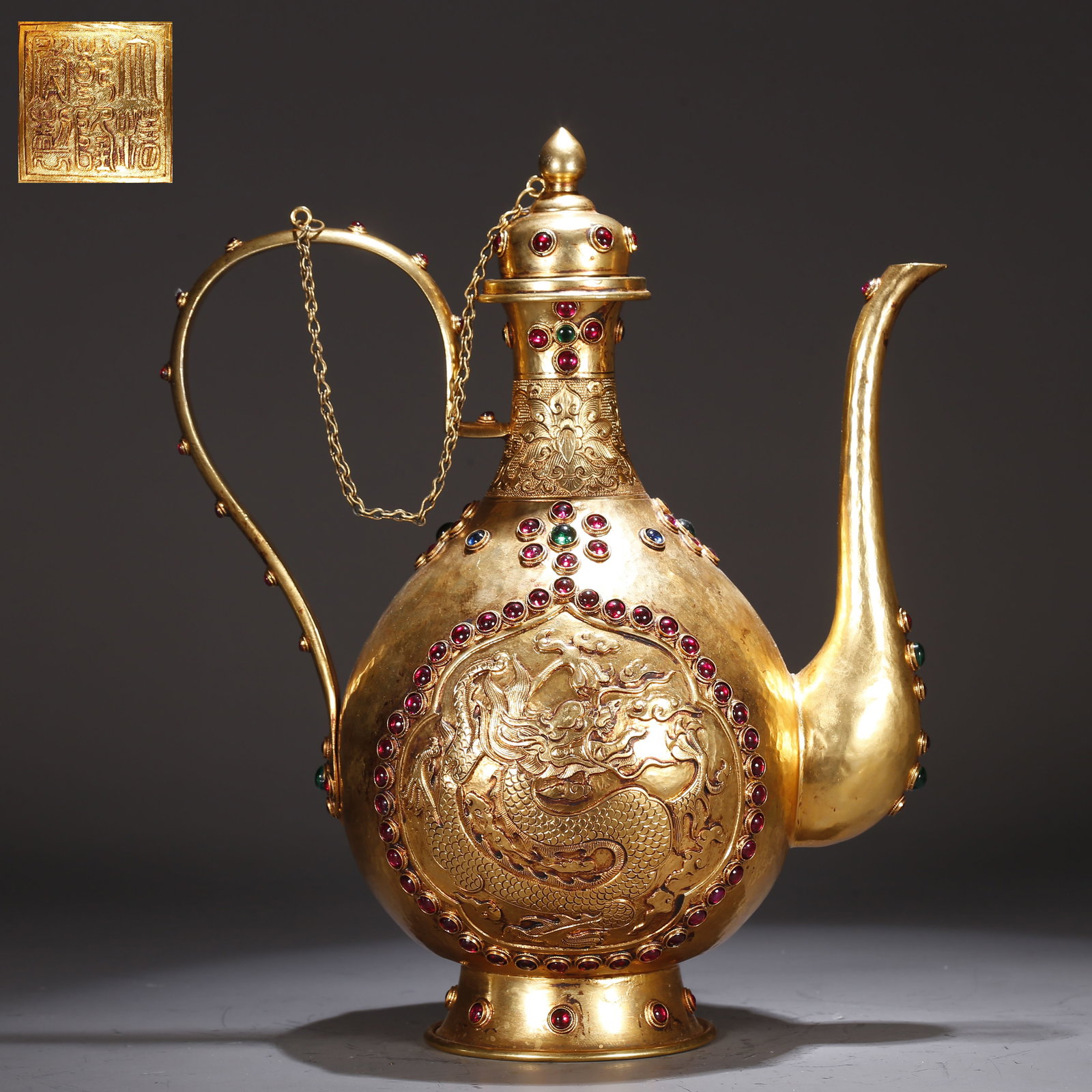 A GILT BRONZE PHOENIX-PATTERNED EWER: Gilt Bronze Phoenix-Patterned Ewer