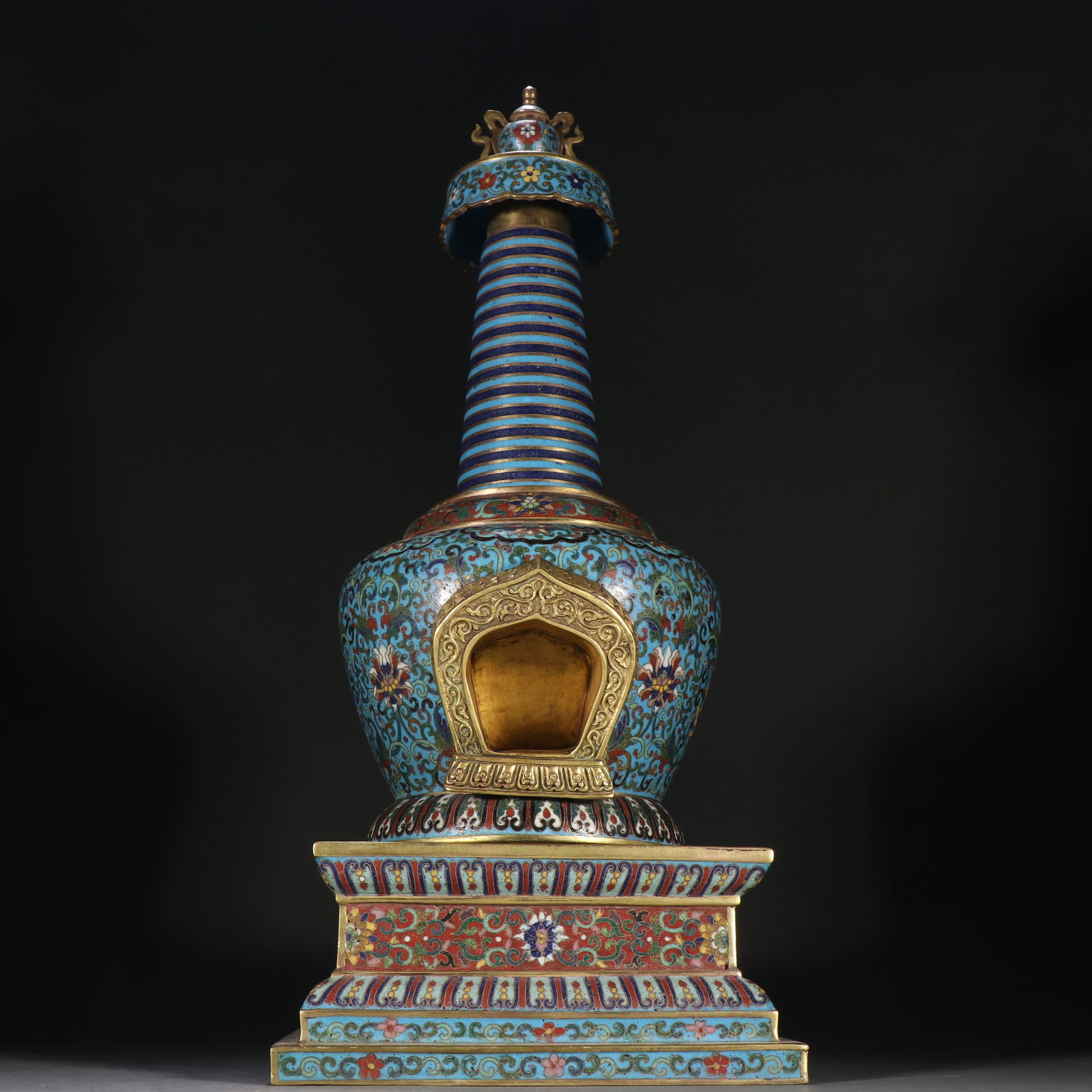 A GILDED BRONZE CLOISONNÉ STUPA WITH INTERLACED LOTUS MOTIFS: Gilded Bronze Cloisonné Stupa with Interlaced Lotus Motifs