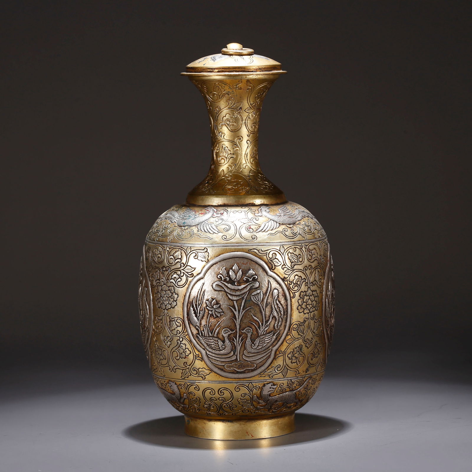 A BRONZE INLAID GOLD AND SILVER COVERED VASE WITH FLORAL PATTERN (1 of 10)