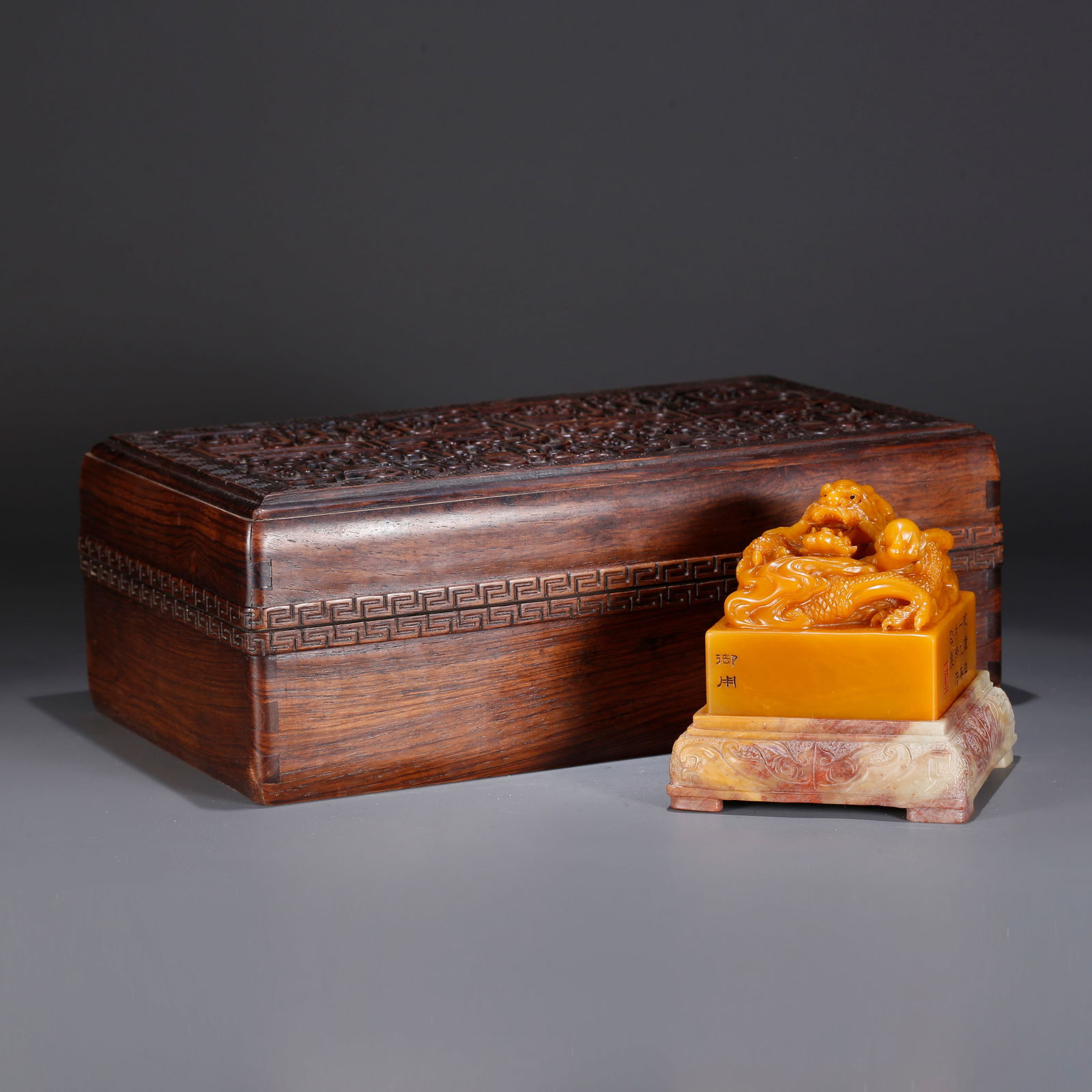 A SHOUSHAN TIANHUANG STONE SEAL WITH DRAGON KNOB: Shoushan Tianhuang stone seal with dragon knob