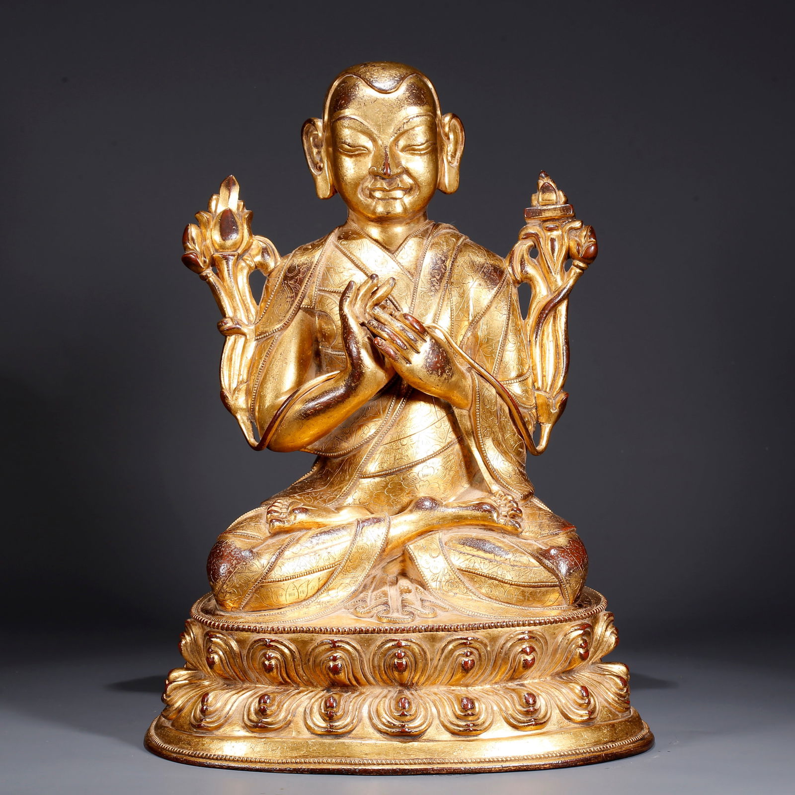A GILDED BRONZE GURU STATUE (1 of 9)
