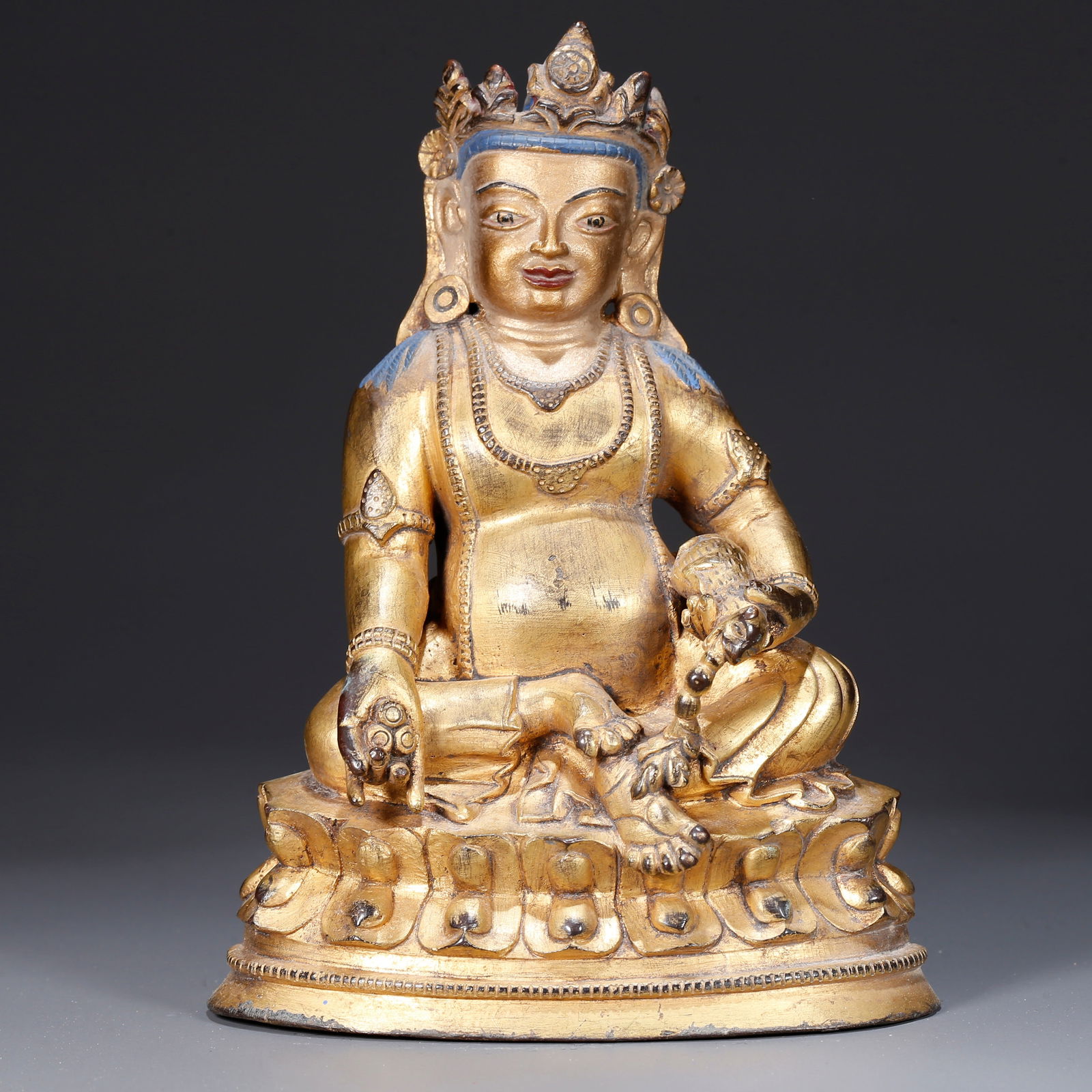 A GILT BRONZE STATUE OF YELLOW JAMBHALA (1 of 9)