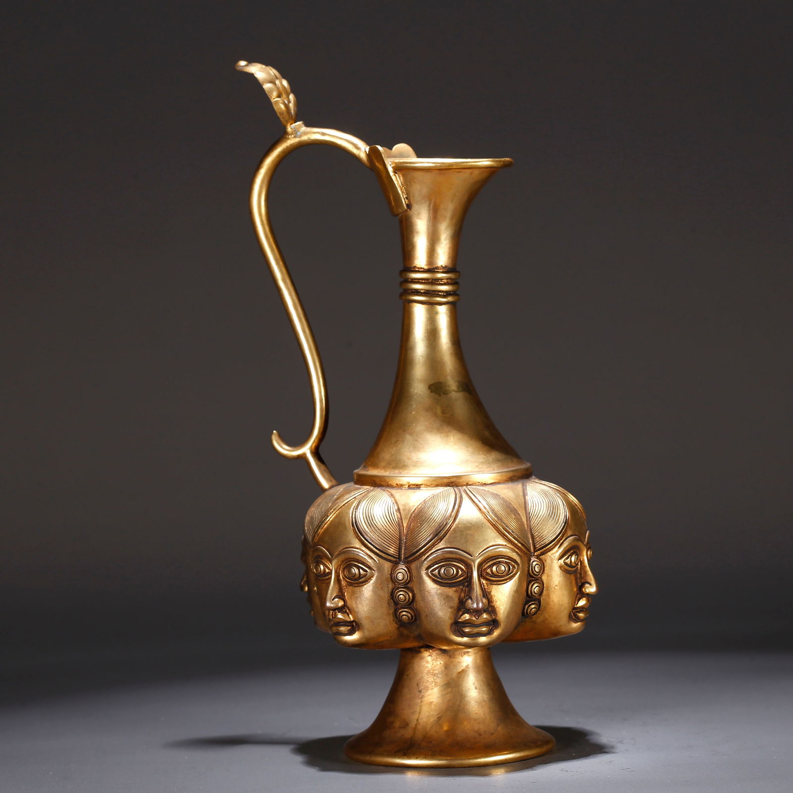A GILT BRONZE EWER: Gilt bronze ewer