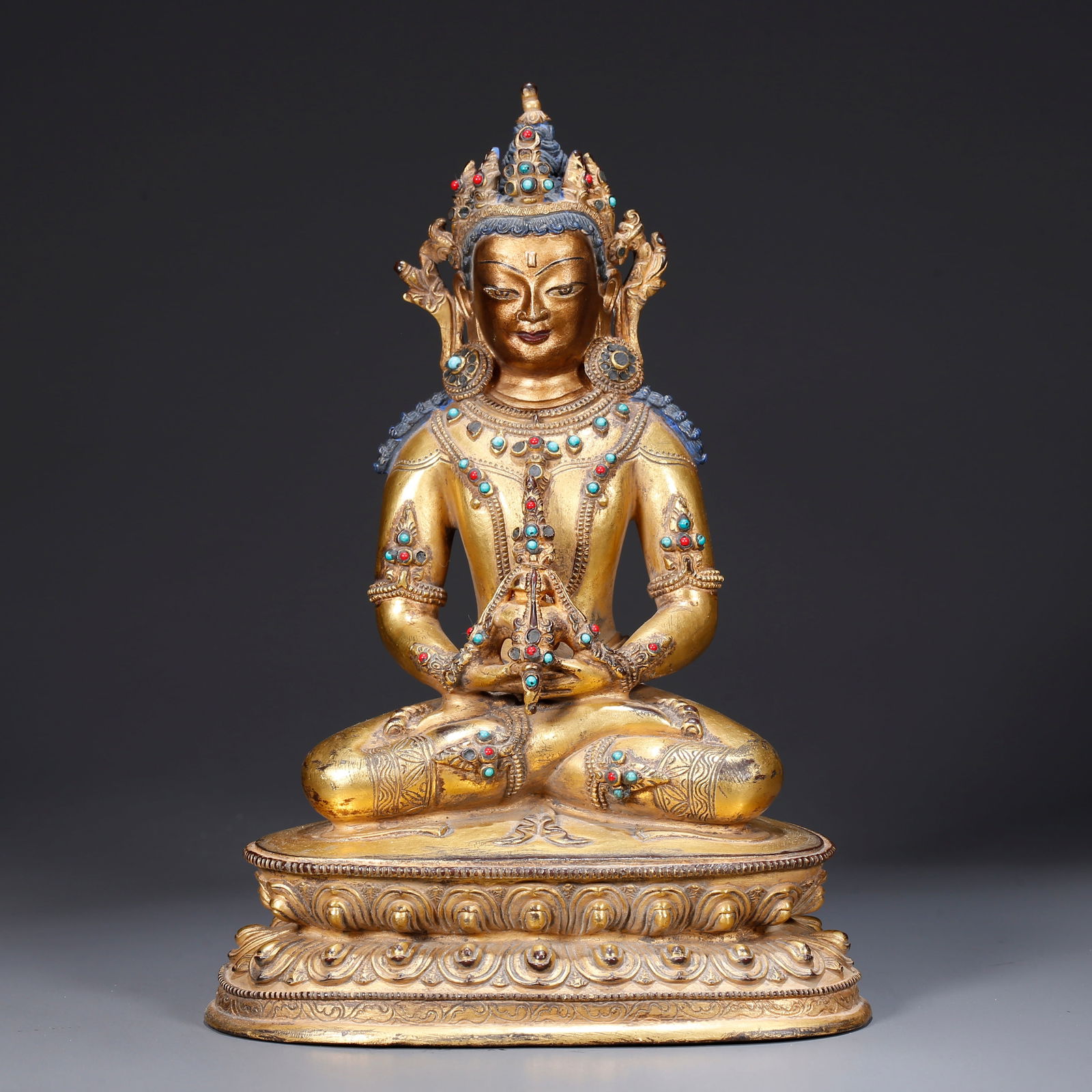 A GILDED BRONZE STATUE OF AMITAYUS (1 of 9)