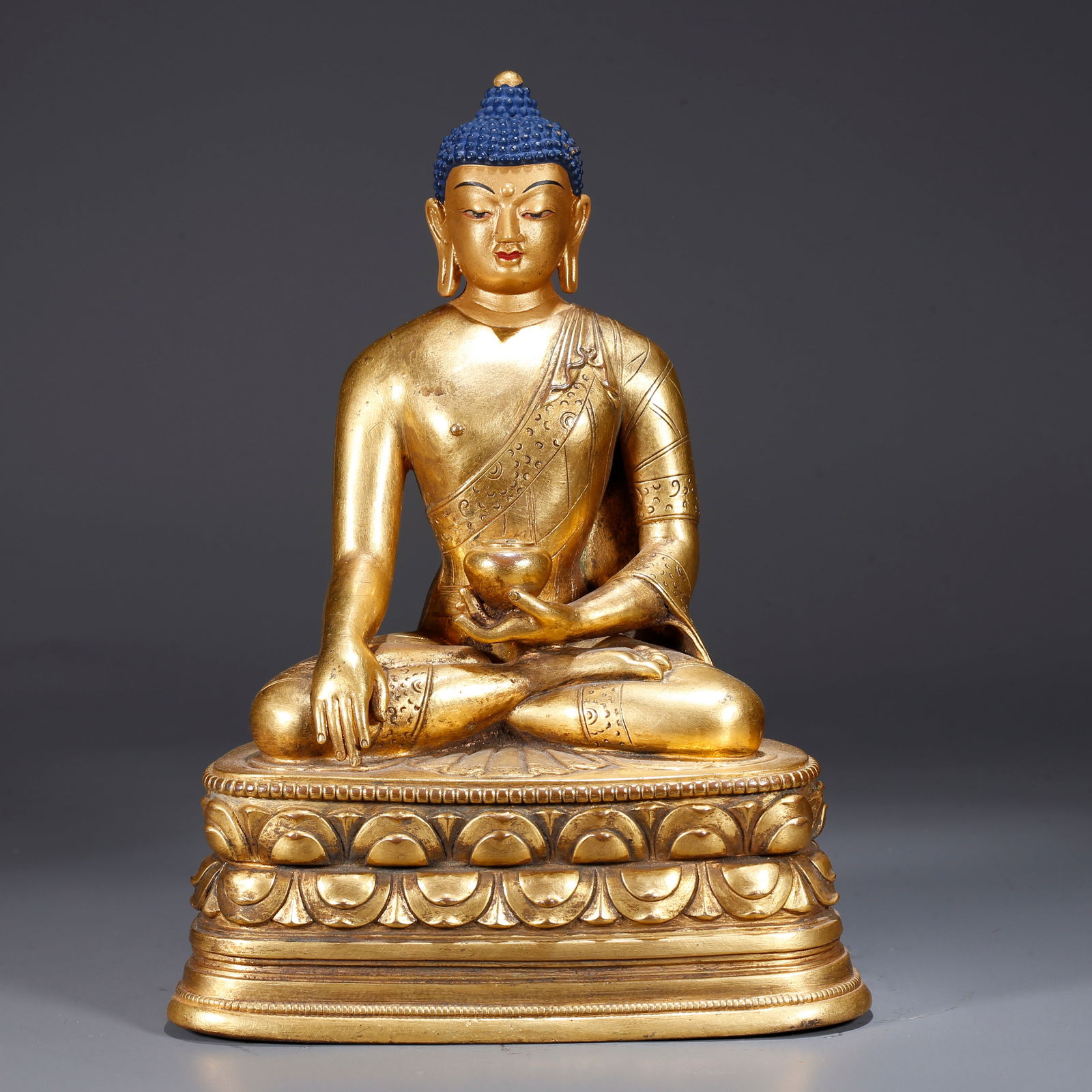 A GILDED BRONZE STATUE OF MEDICINE BUDDHA (1 of 9)