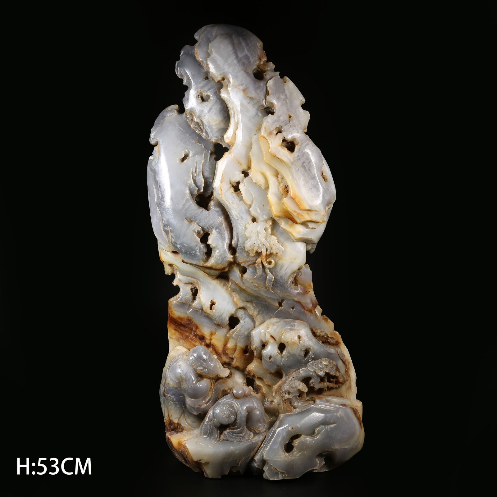 A QING DYNASTY HETIAN JADE MOUNTAIN MODEL WITH FIGURE AND NARRATIVE SCENE PATTERN: Qing Dynasty Hetian Jade Mountain Model with Figure and Narrative Scene Pattern