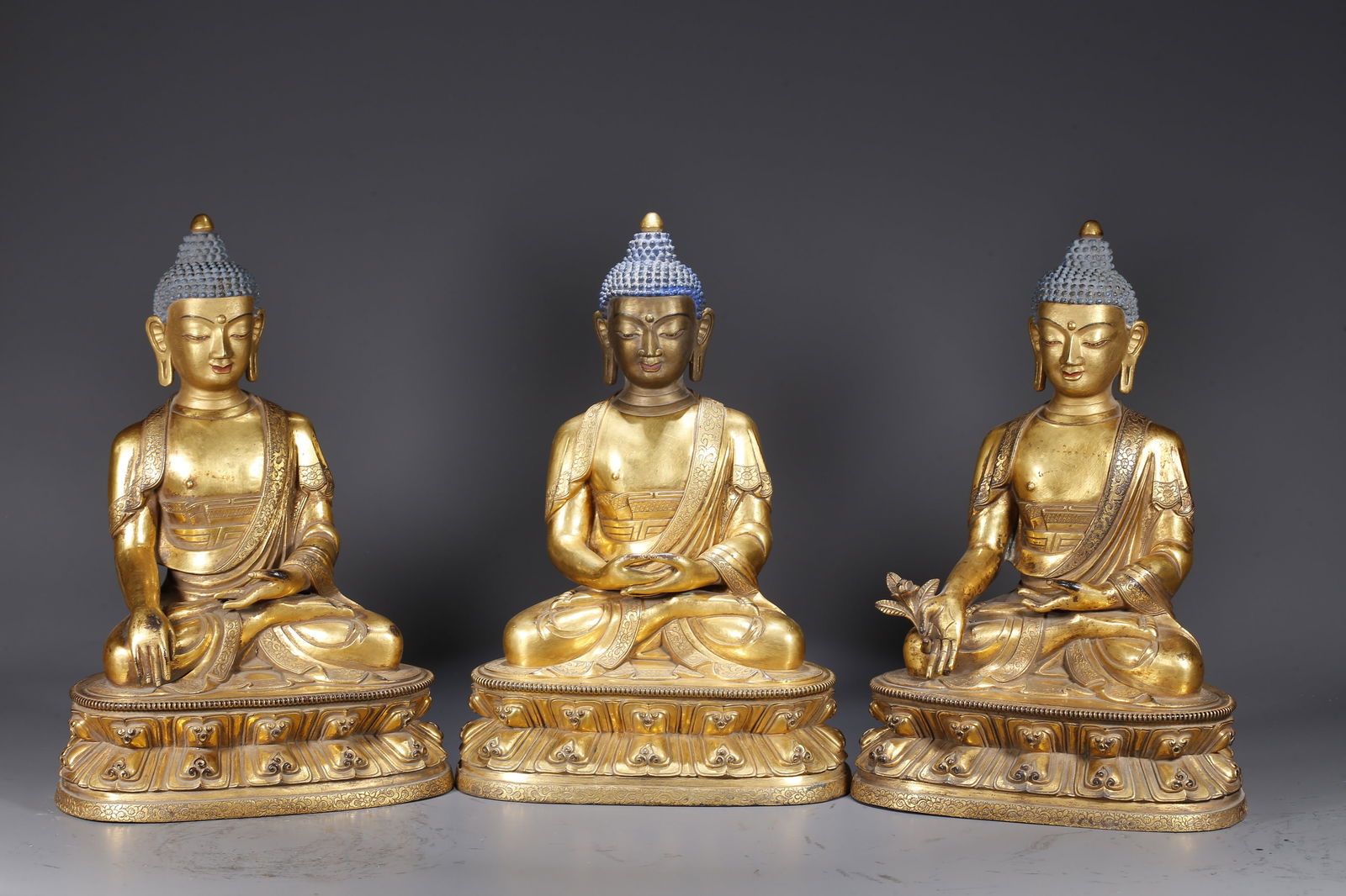 A SET OF GILDED BRONZE STATUES OF SHAKYAMUNI (1 of 10)