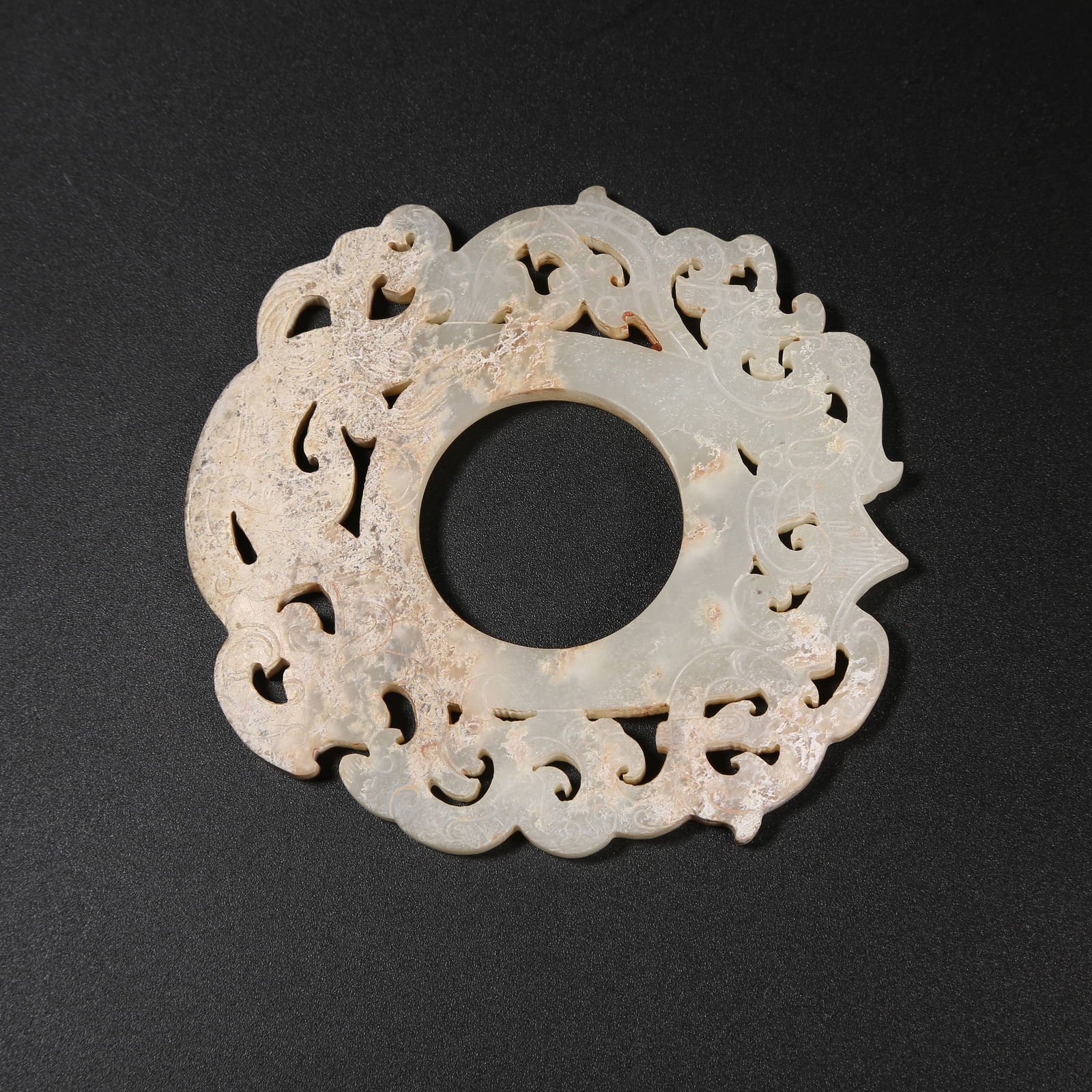 A HAN DYNASTY ANCIENT JADE CHICKEN-HEART PENDANT WITH KUI DRAGON PATTERN (1 of 9)