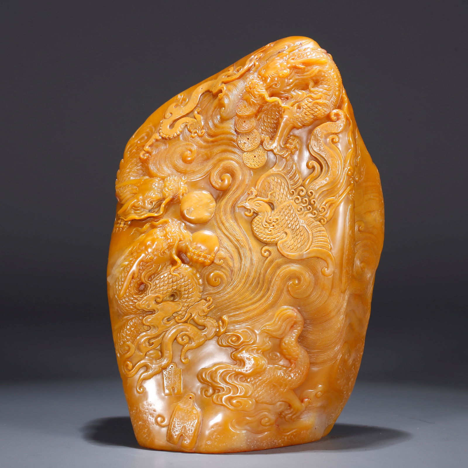 A SHOUSHAN TIANHUANG STONE SEAL CARVED WITH DRAGON AND PHOENIX MOTIF: Shoushan Tianhuang Stone Seal Carved with Dragon and Phoenix Motif