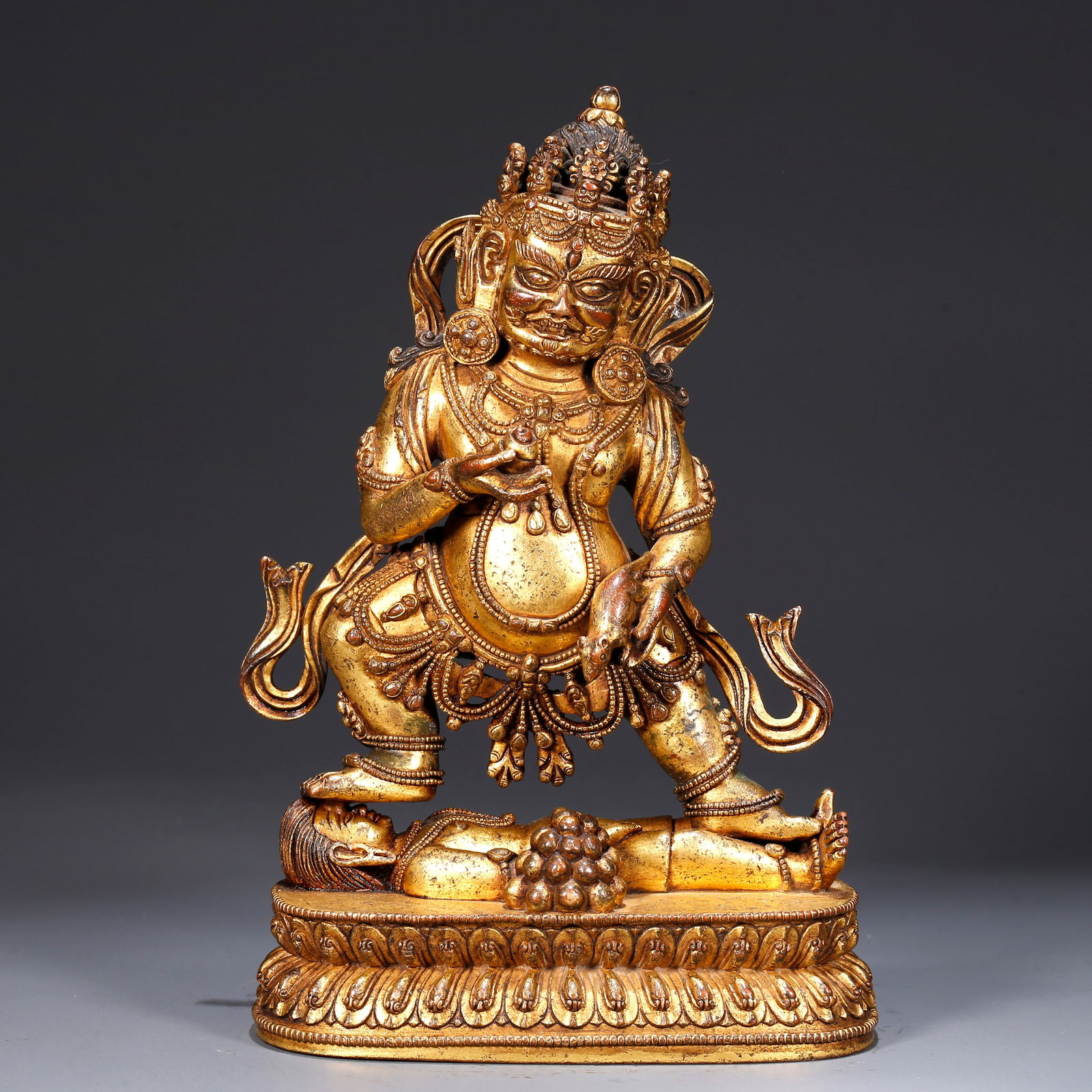 A GILDED BRONZE STATUE OF THE GOD OF WEALTH (1 of 9)