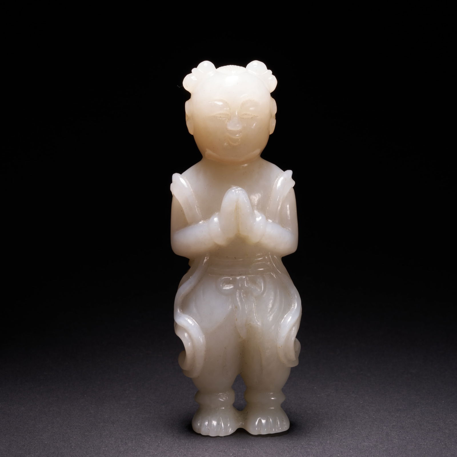 A HETIAN JADE "WEALTH-ATTRACTING BOY" ORNAMENT, QING DYNASTY (1 of 10)