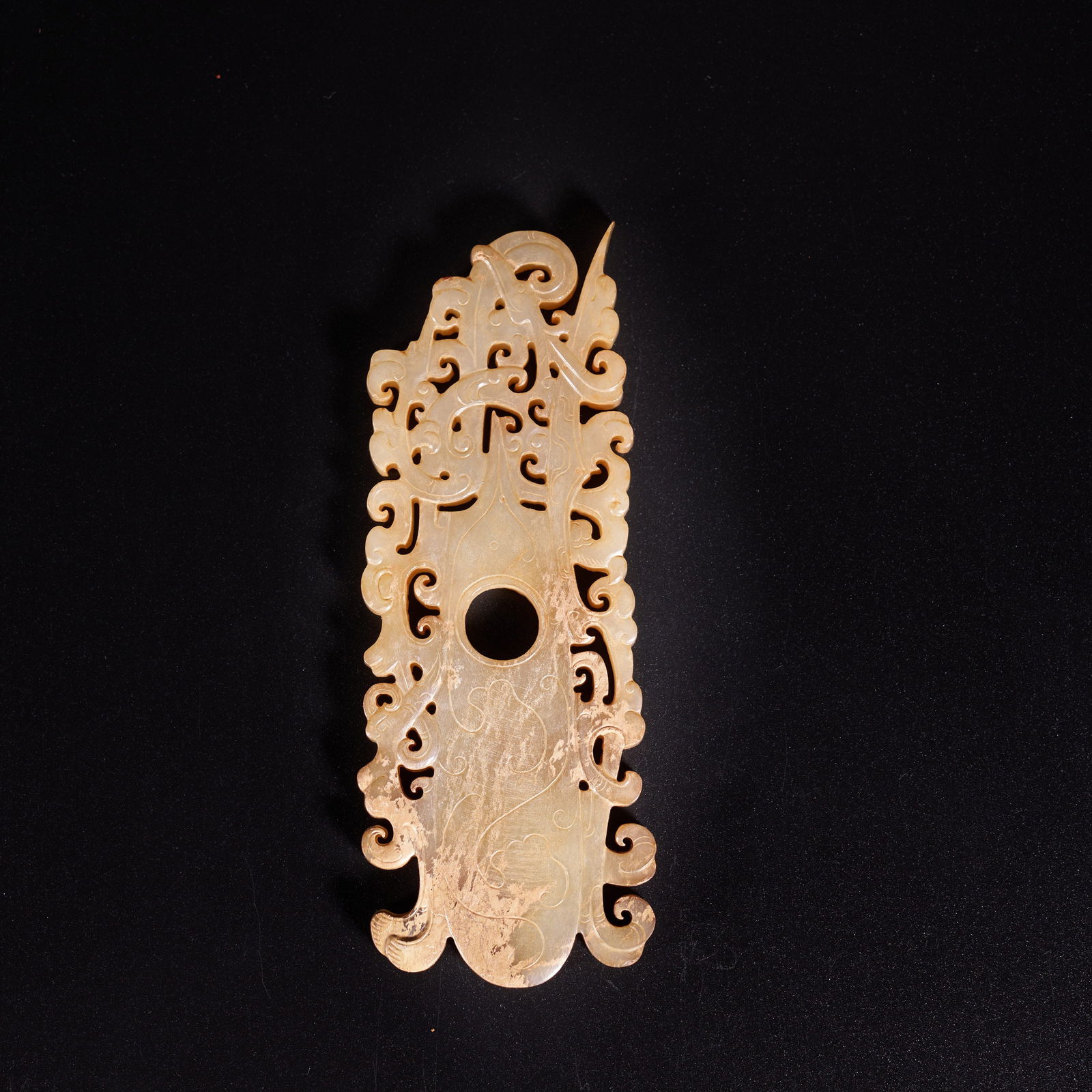 A HIGH-ANTIQUITY JADE CHICKEN-HEART-SHAPED PENDANT (1 of 9)