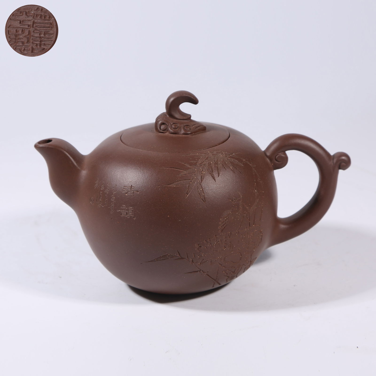 A ZISHA TEAPOT WITH FLOWER-AND-BIRD MOTIF (1 of 8)