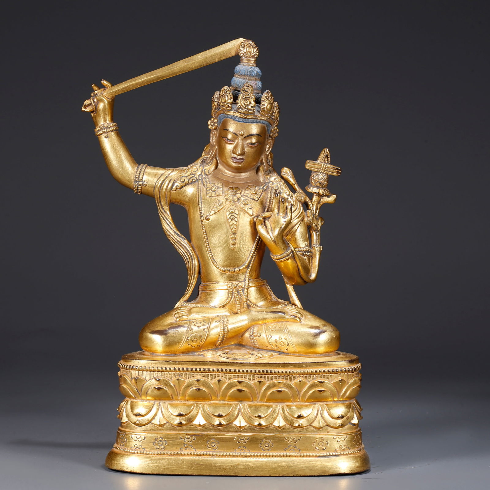A GILDED BRONZE STATUE OF MANJUSHRI (1 of 9)
