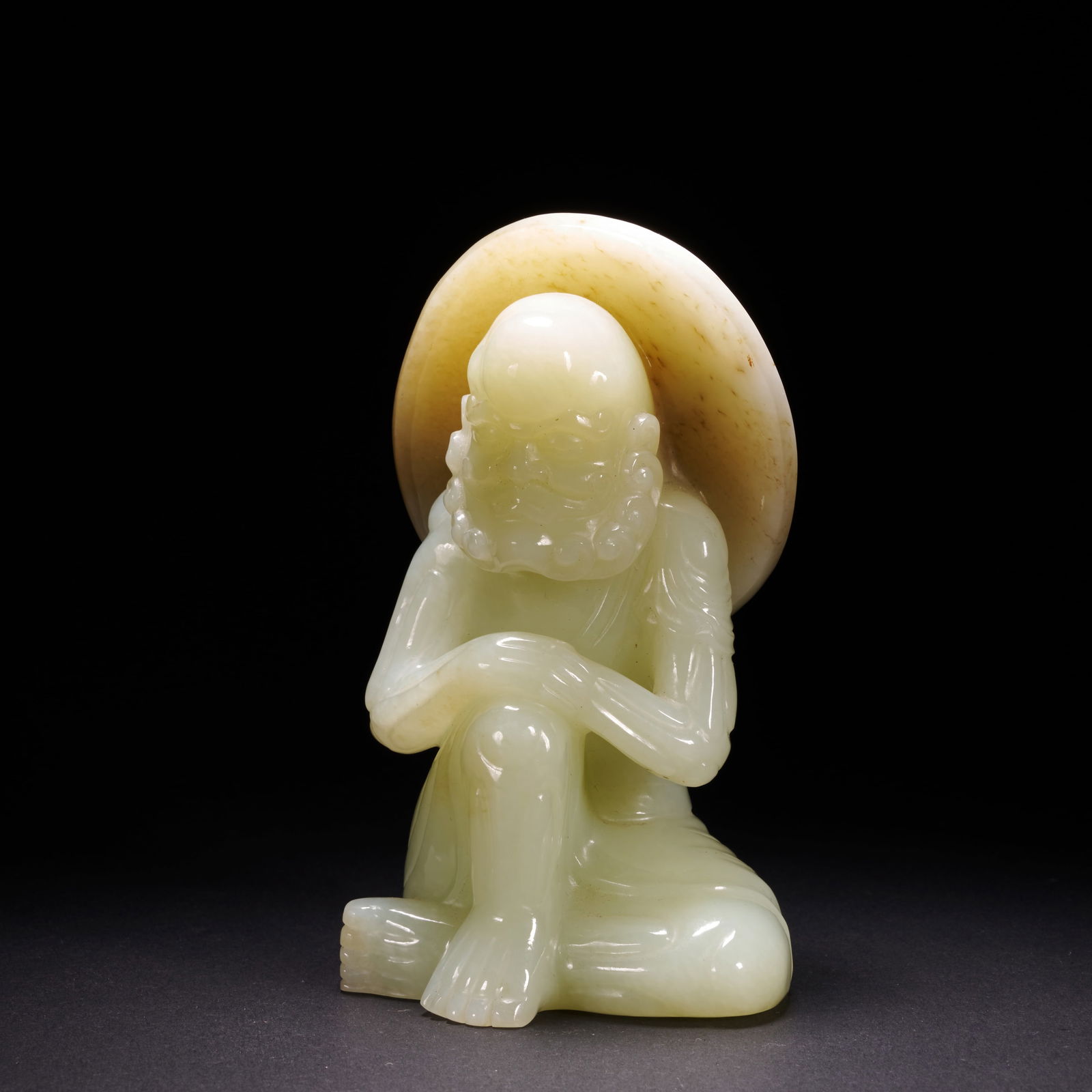 A HETIAN JADE LUOHAN (ARHAT) FIGURE, QING DYNASTY (1 of 9)