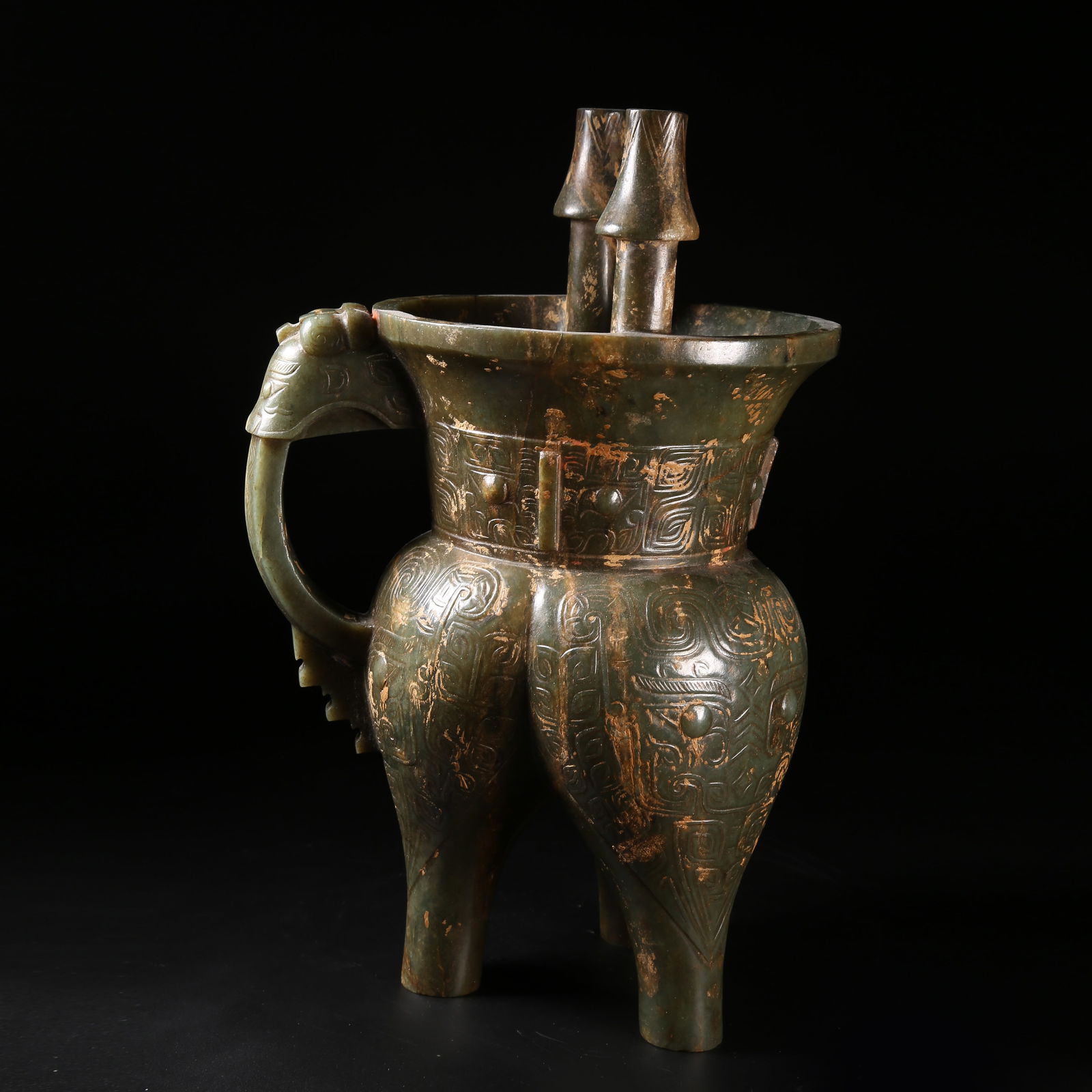 A PRE-HAN ANCIENT JADE JIA WITH BEAST-FACE PATTERN (1 of 10)