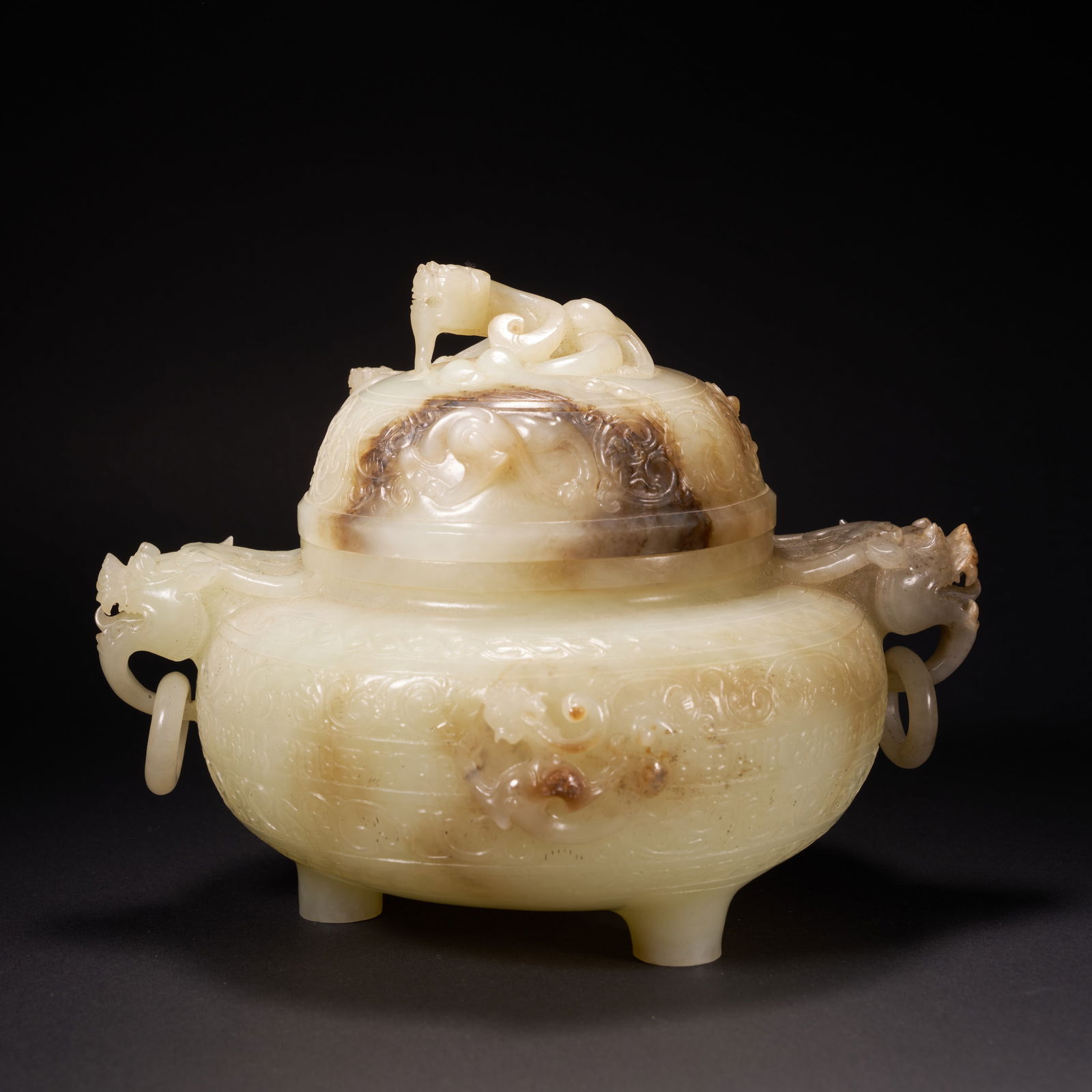 A HETIAN JADE LIDDED CENSER WITH BEAST-MASK HANDLES, MOVABLE RINGS, AND DRAGON FINIAL, HAN DYNASTY (1 of 10)