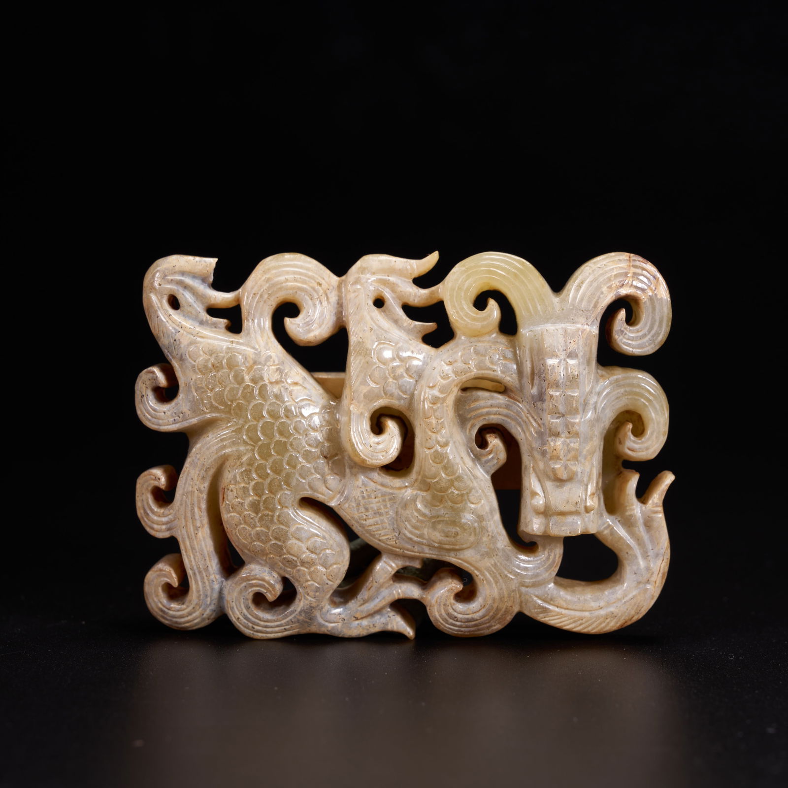 A HIGH-ANTIQUITY JADE DRAGON-FORM BELT PENDANT (1 of 8)