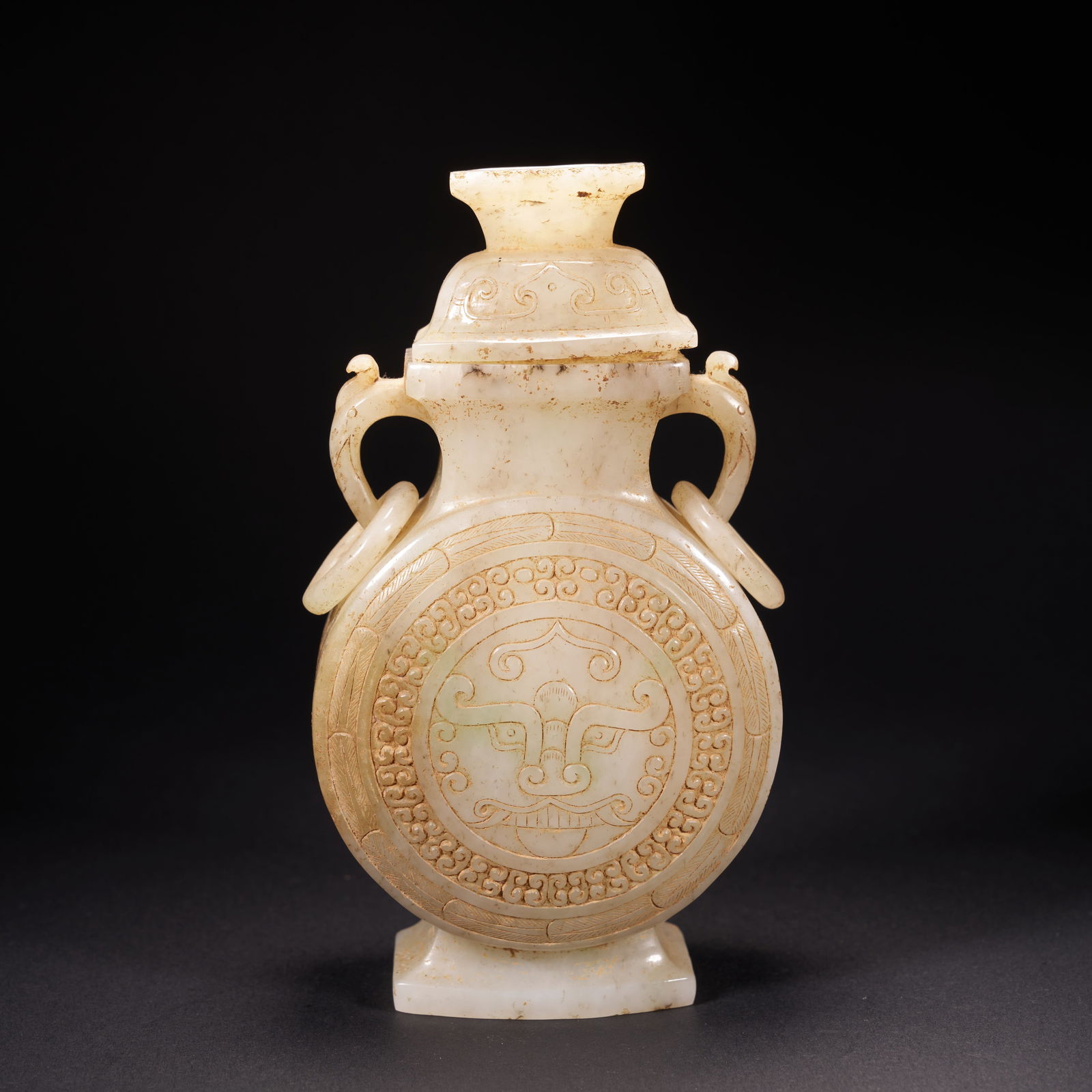 A HETIAN JADE LIDDED VASE WITH ARCHAISTIC (BOGU) MOTIFS AND MOVABLE RINGS, HAN DYNASTY (1 of 10)