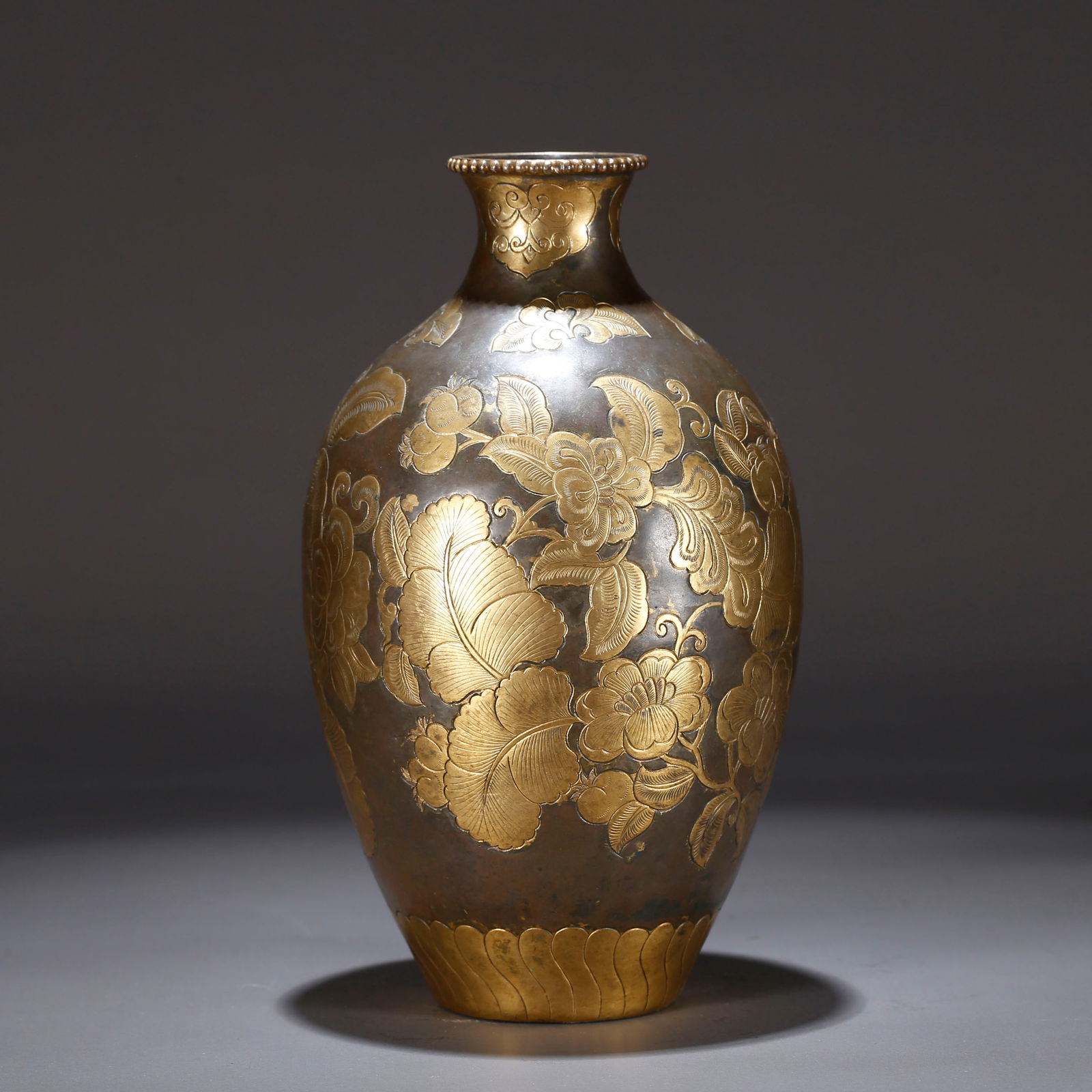 A GILT BRONZE VASE WITH FLORAL PATTERN (1 of 10)