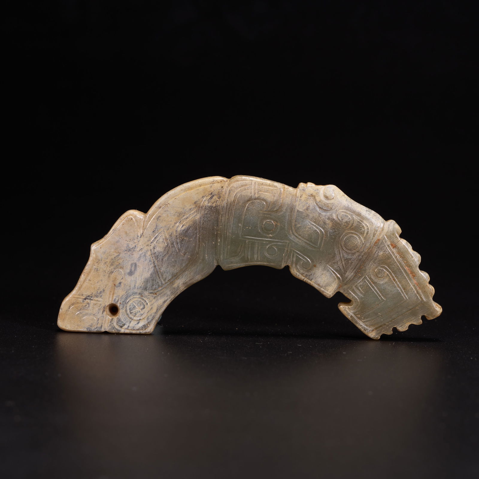 A HIGH-ANTIQUITY JADE HUANG PENDANT (1 of 8)