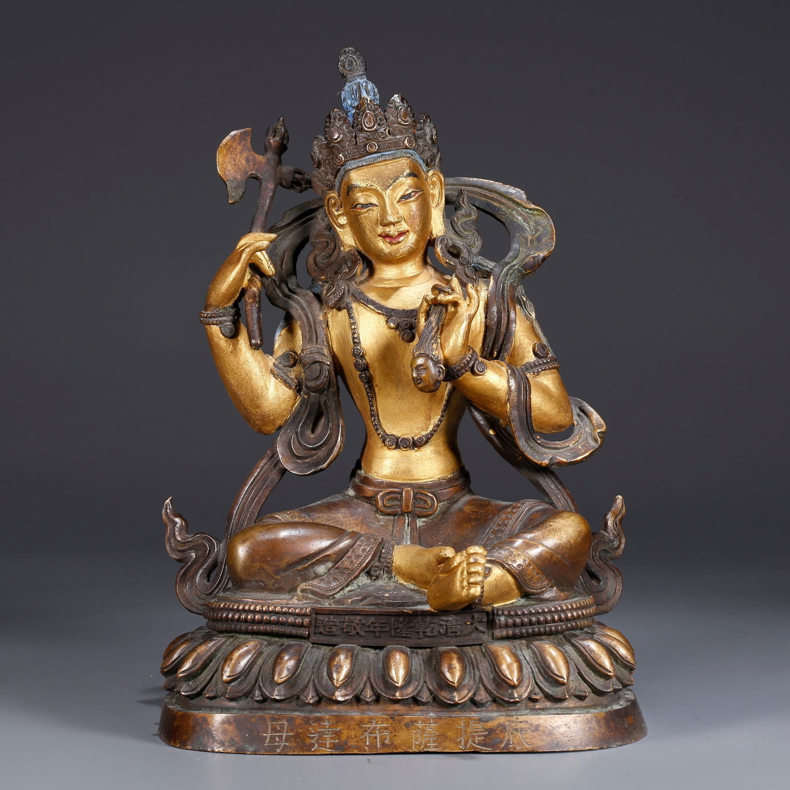 A GILDED BRONZE BUDDHA STATUE (1 of 9)