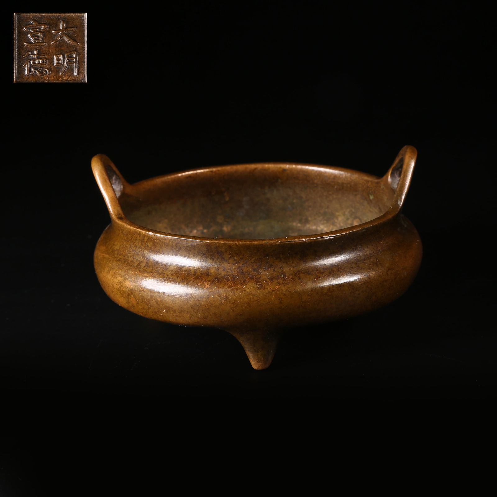 A BRONZE TRIPOD CENSER WITH UPRIGHT EARS: Bronze Tripod Censer with Upright Ears