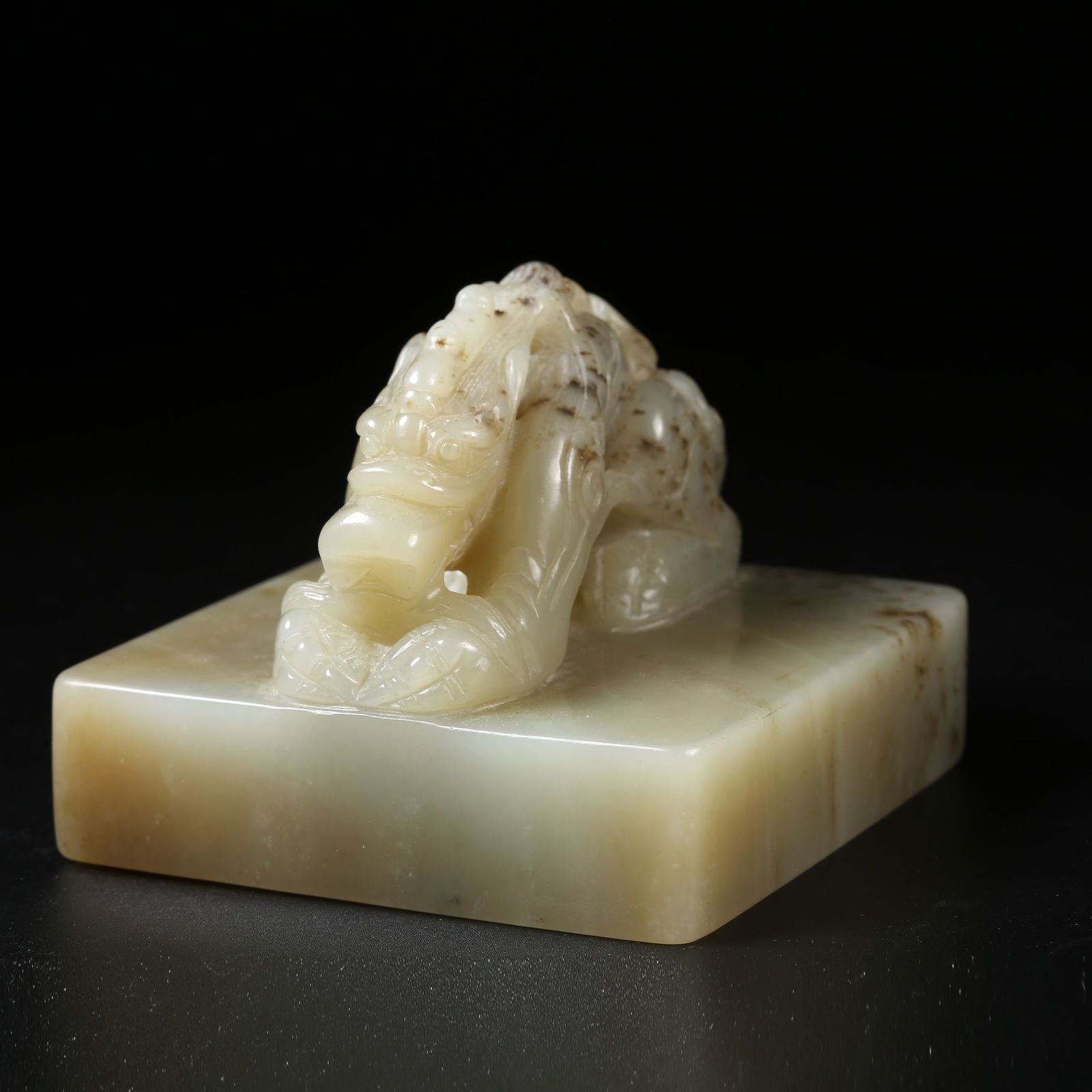 A YUAN DYNASTY HETIAN JADE SEAL WITH DRAGON HANDLE (1 of 9)