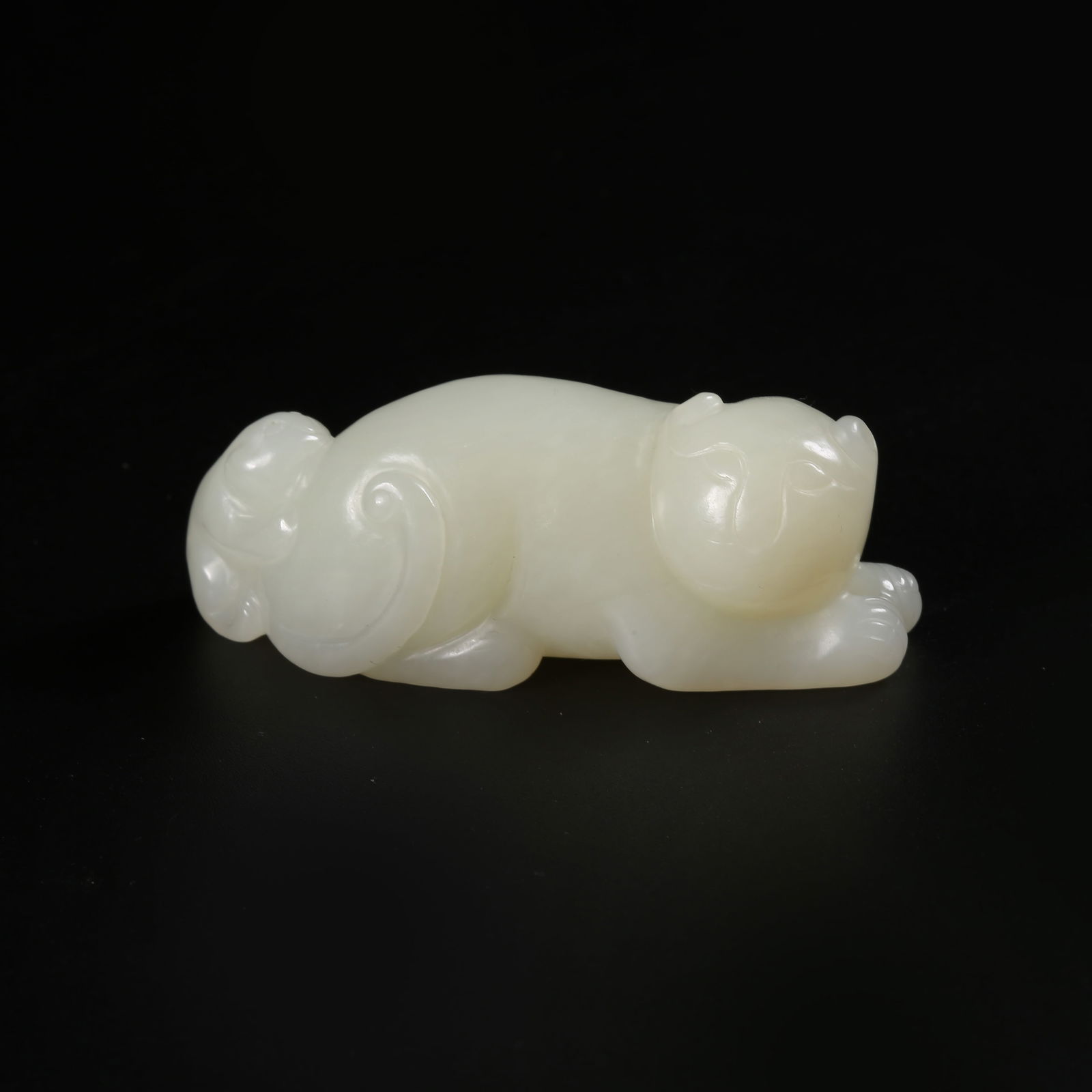 A HETIAN JADE ORNAMENT WITH DOUBLE RINGS: Hetian Jade Ornament with Double Rings