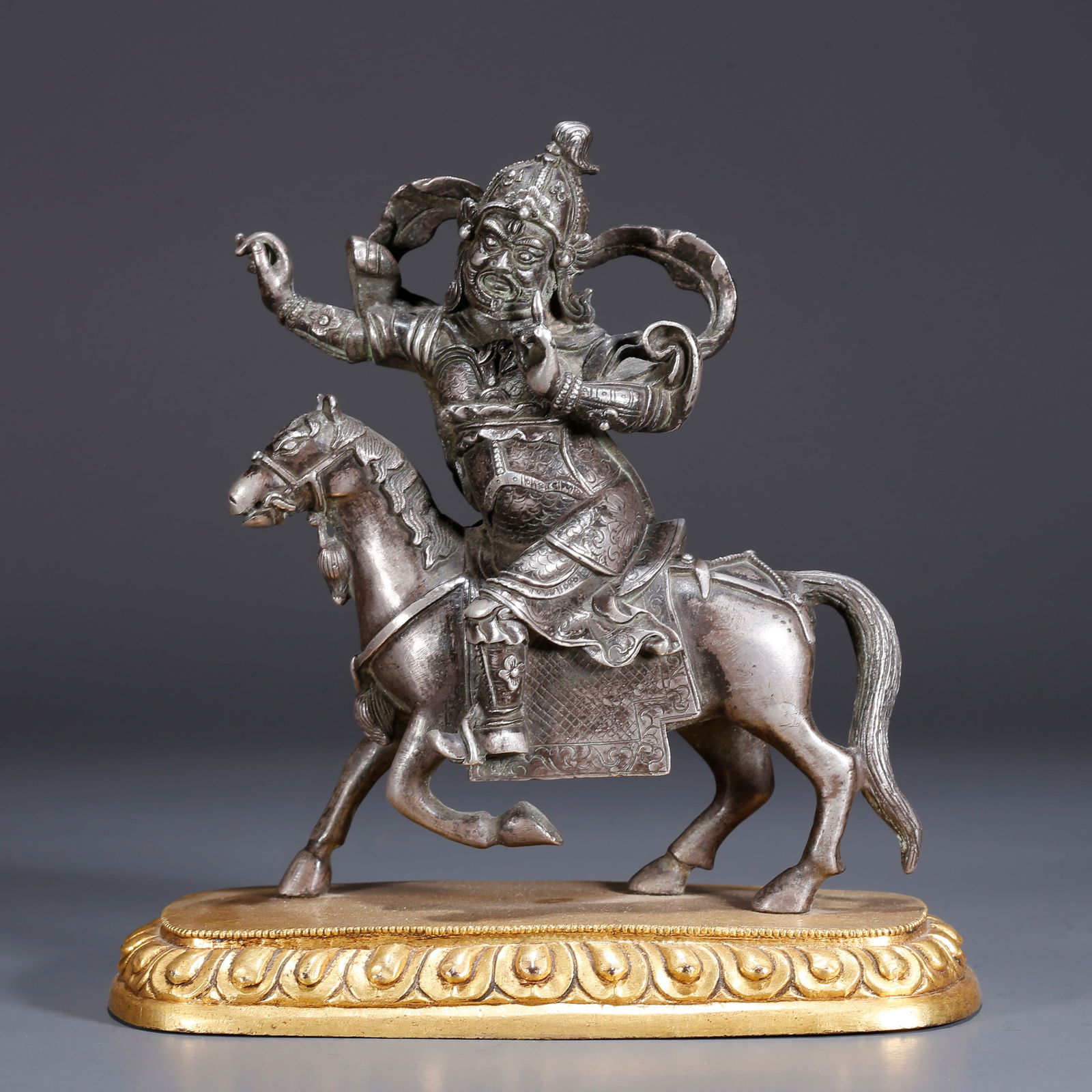 A SILVER BUDDHA STATUE (1 of 9)