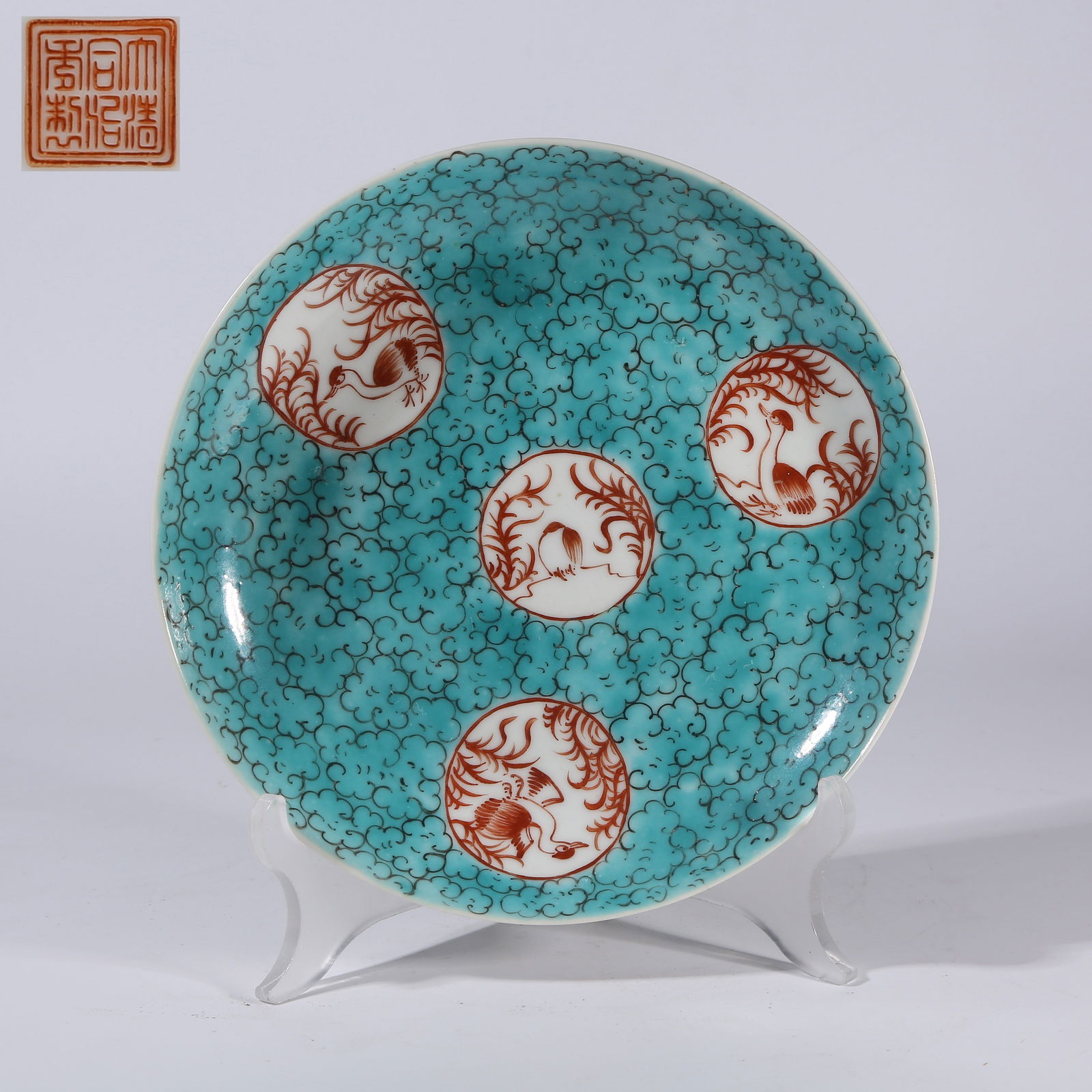 A TURQUOISE-GLAZED PLATE WITH OPENWORK PATTERN AND CORAL-RED FLOWER-AND-BIRD MOTIF (1 of 8)