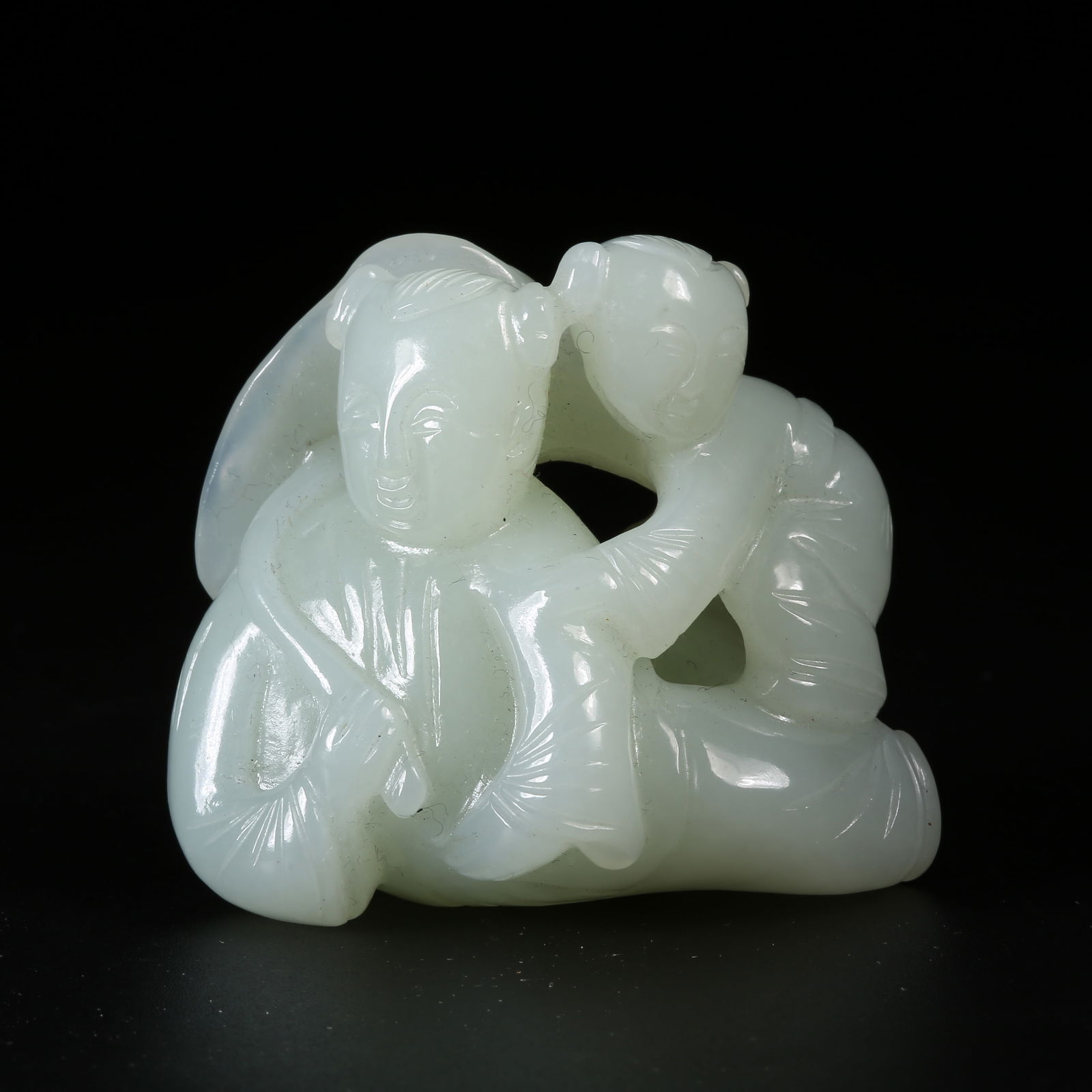 A HETIAN JADE LOTUS-LEAF BOY ORNAMENT (1 of 8)
