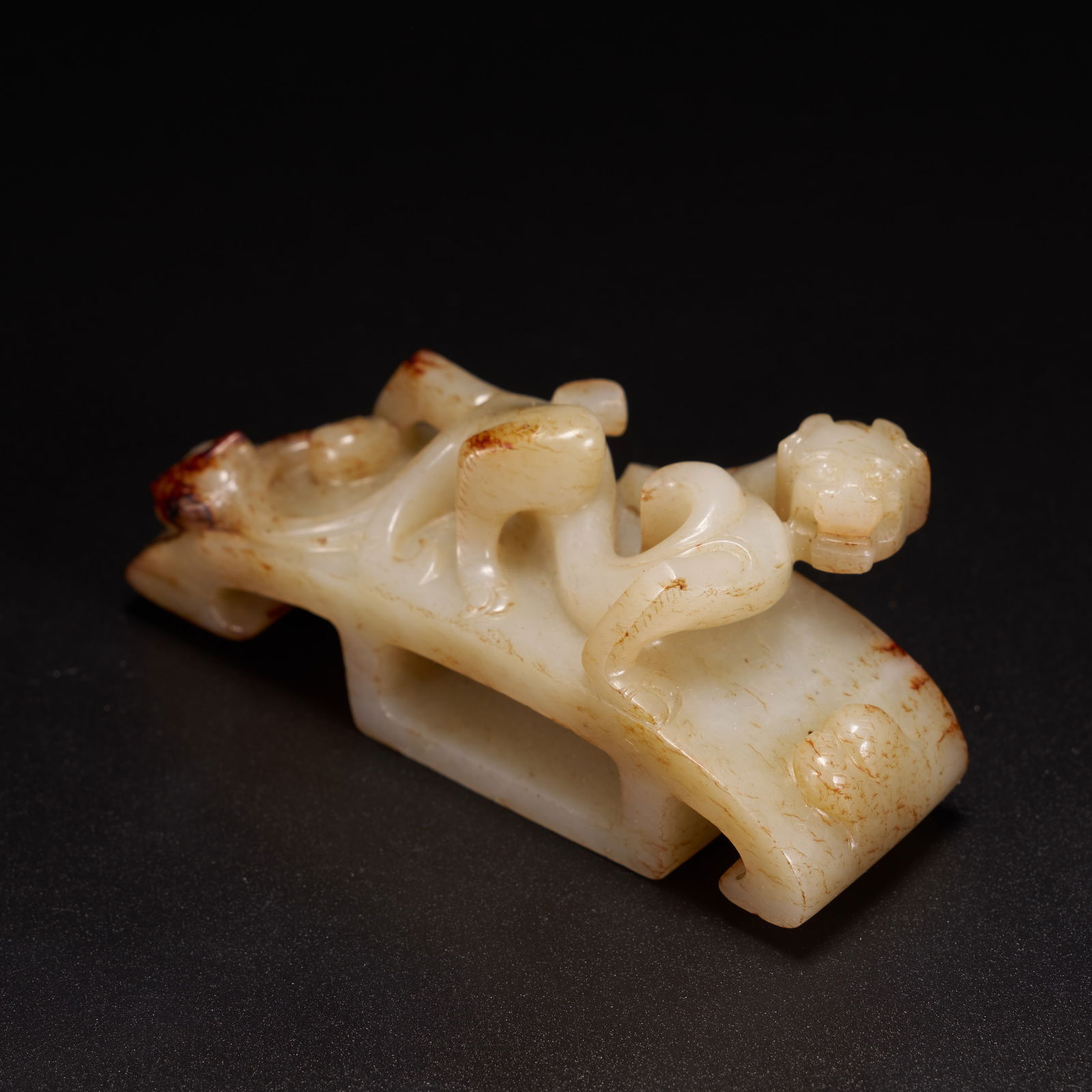 A HIGH-ANTIQUITY JADE SWORD GUARD WITH CHI-DRAGON MOTIFS (1 of 6)