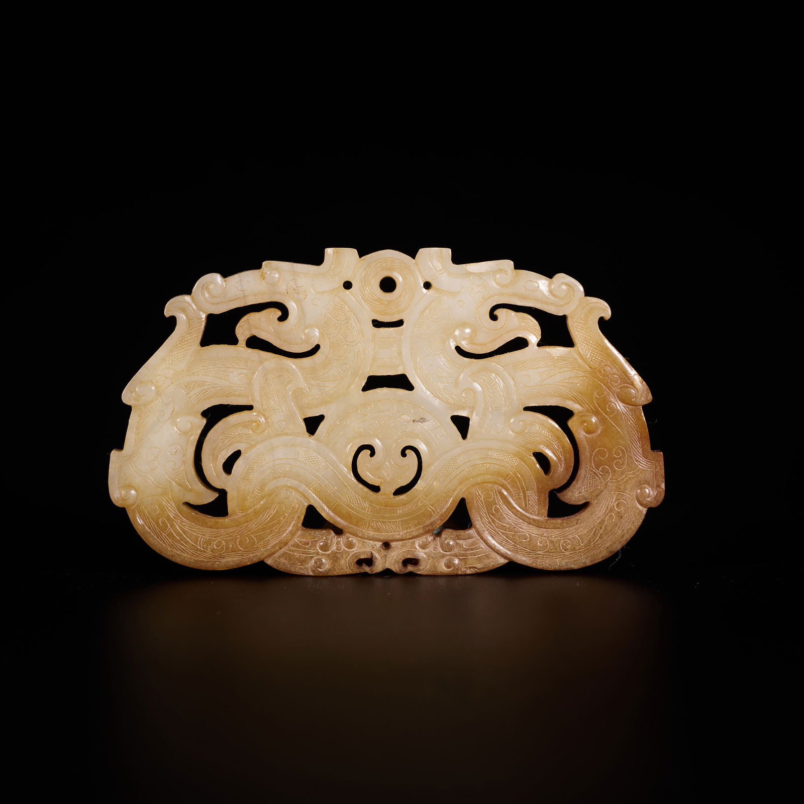 A HIGH-ANTIQUITY JADE DOUBLE-DRAGON PENDANT (1 of 12)