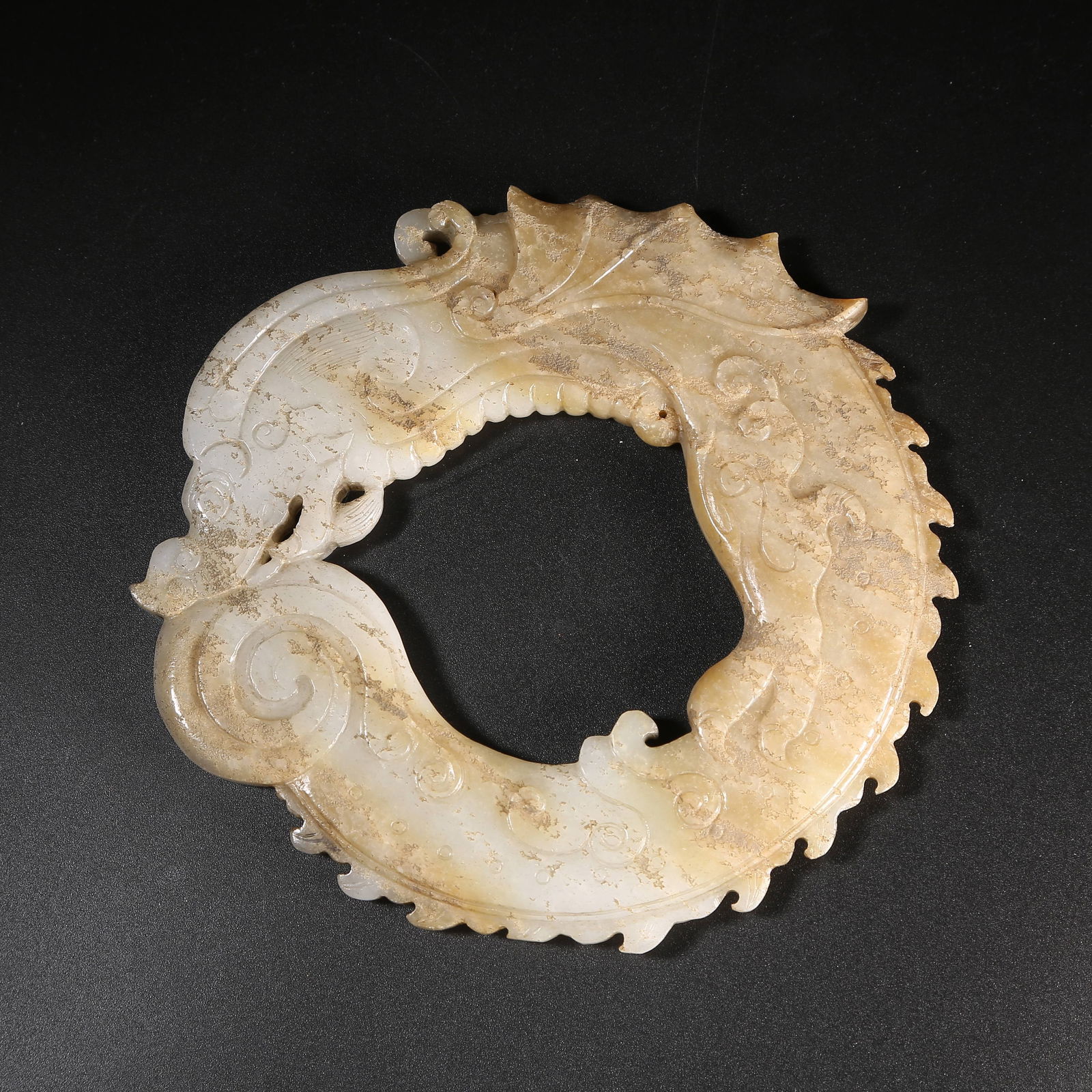 A MING DYNASTY HETIAN WHITE JADE OUROBOROS DRAGON RING (1 of 9)