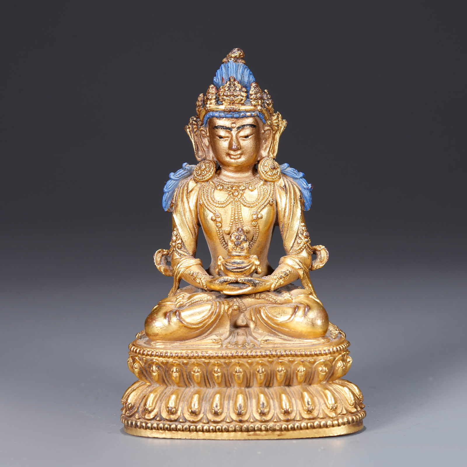A GILT BRONZE STATUE OF AMITAYUS (BUDDHA OF LONG LIFE) (1 of 9)