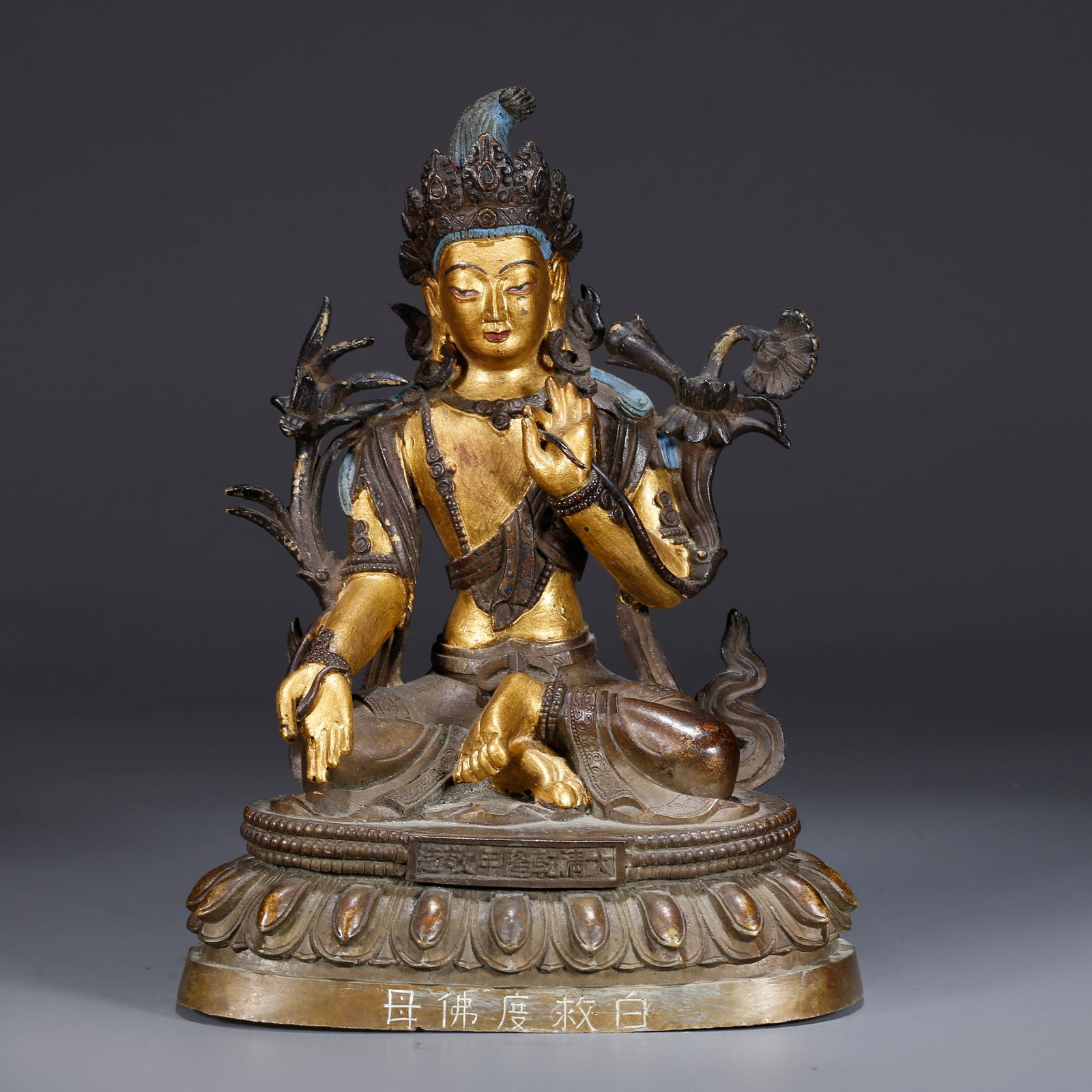 A GILDED BRONZE STATUE OF WHITE TARA (1 of 9)