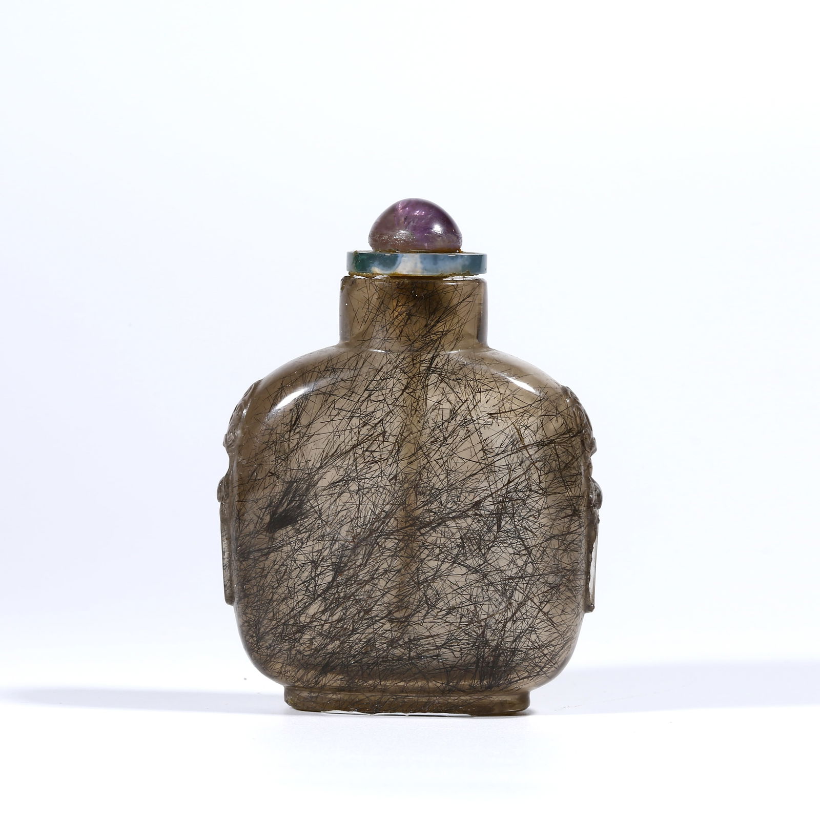 A RUTILATED QUARTZ SNUFF BOTTLE WITH ANIMAL-HEAD HANDLES (1 of 9)