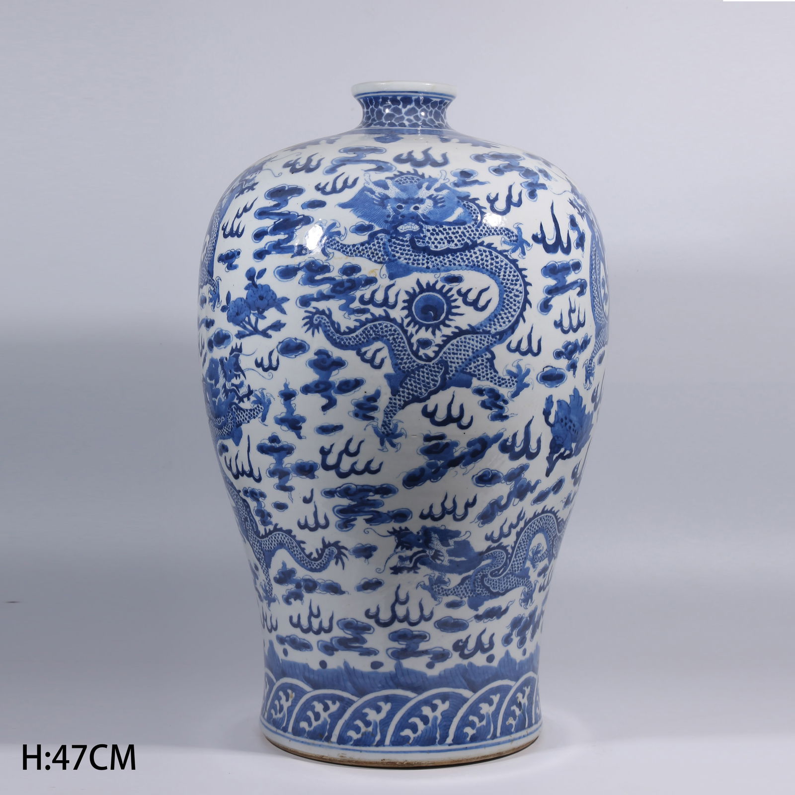 A BLUE-AND-WHITE MEIPING VASE WITH CLOUD AND DRAGON PATTERN (1 of 9)
