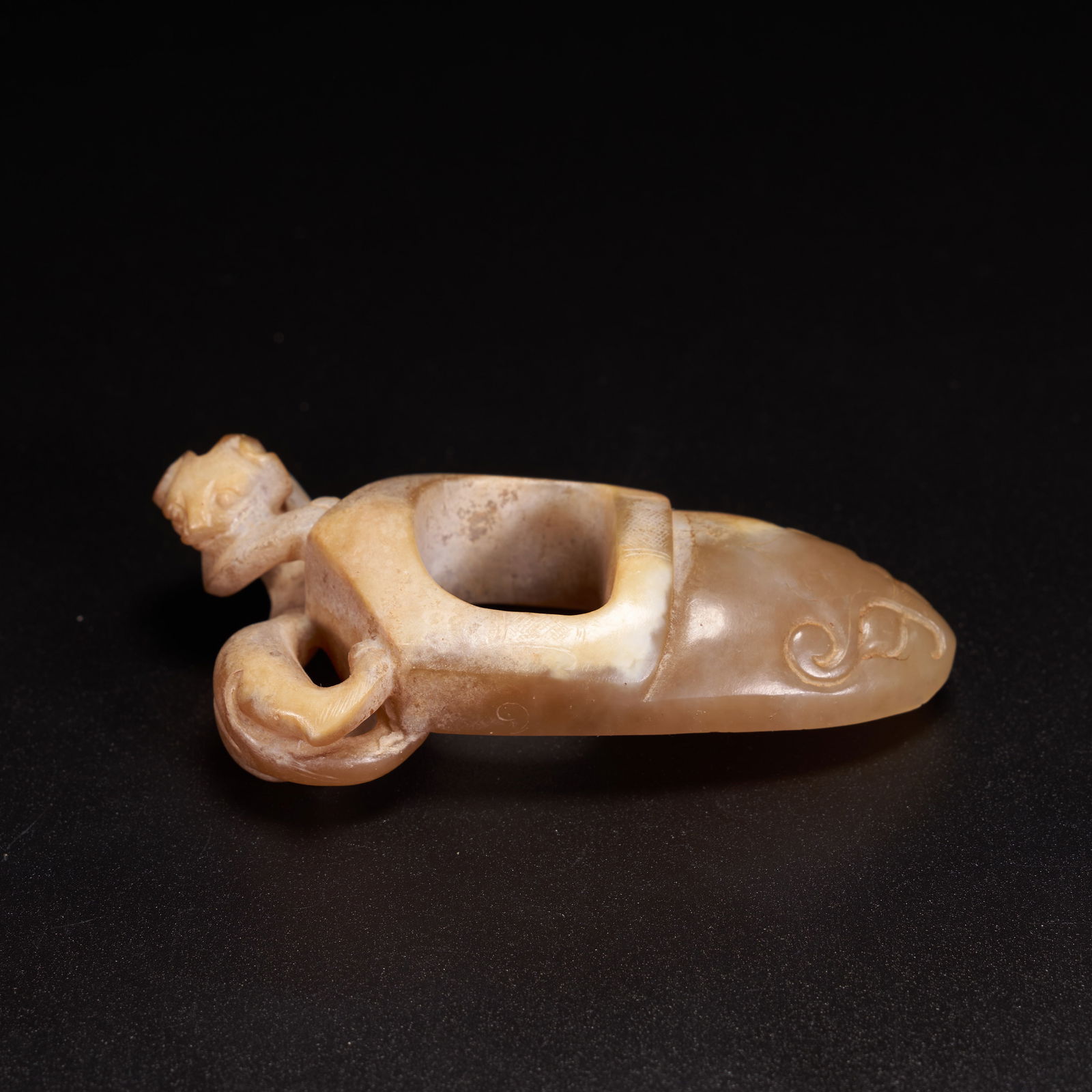 A HIGH-ANTIQUITY JADE CHICKEN-HEART-SHAPED PENDANT WITH CHI-DRAGON MOTIFS (1 of 7)