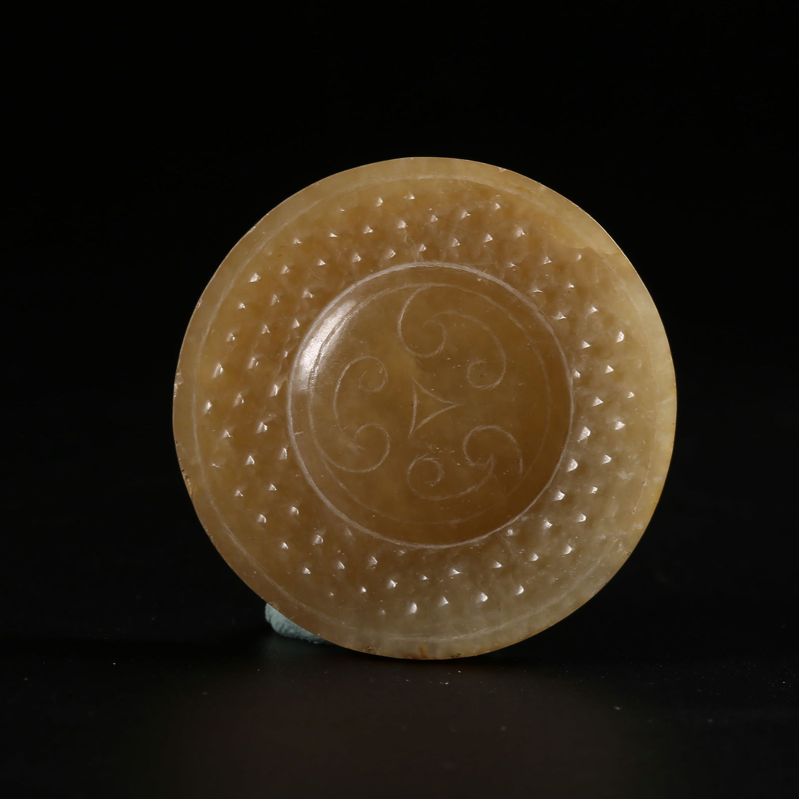 A HIGH-ANTIQUITY JADE SWORD POMMEL (1 of 8)