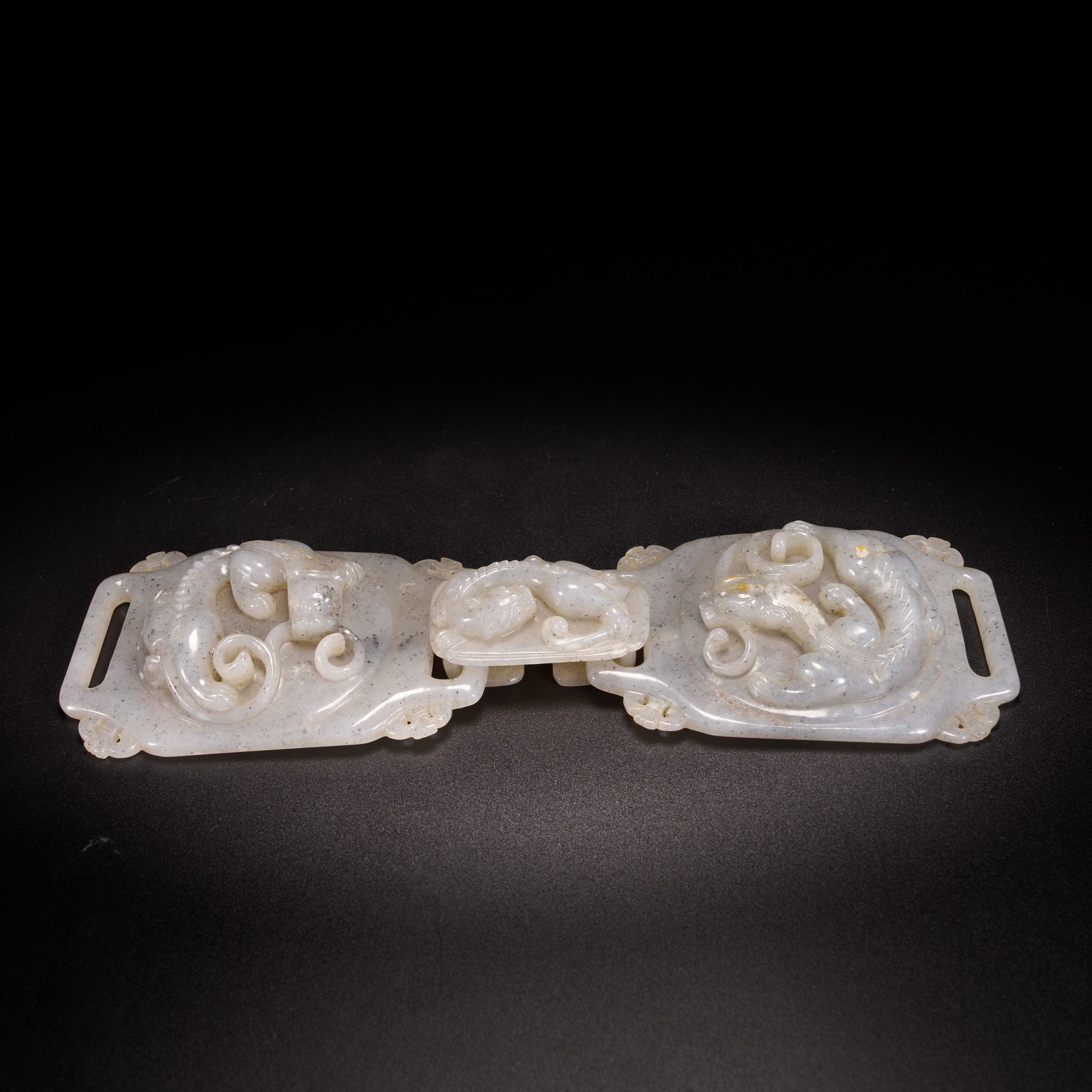 A HIGH-ANTIQUITY JADE BELT BUCKLE WITH CHI-DRAGON MOTIFS: High-Antiquity Jade Belt Buckle with Chi-Dragon Motifs