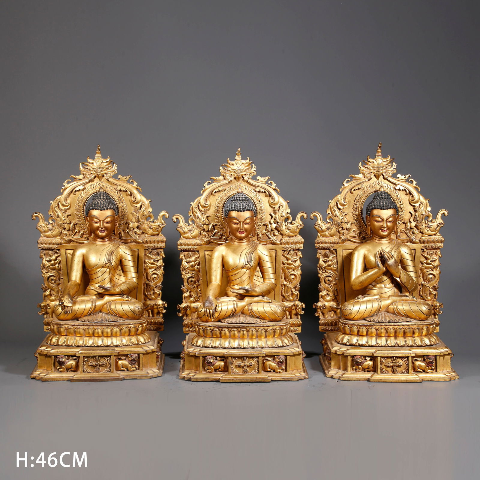 A GILDED BRONZE SHAKYAMUNI STATUES (A SET) (1 of 10)