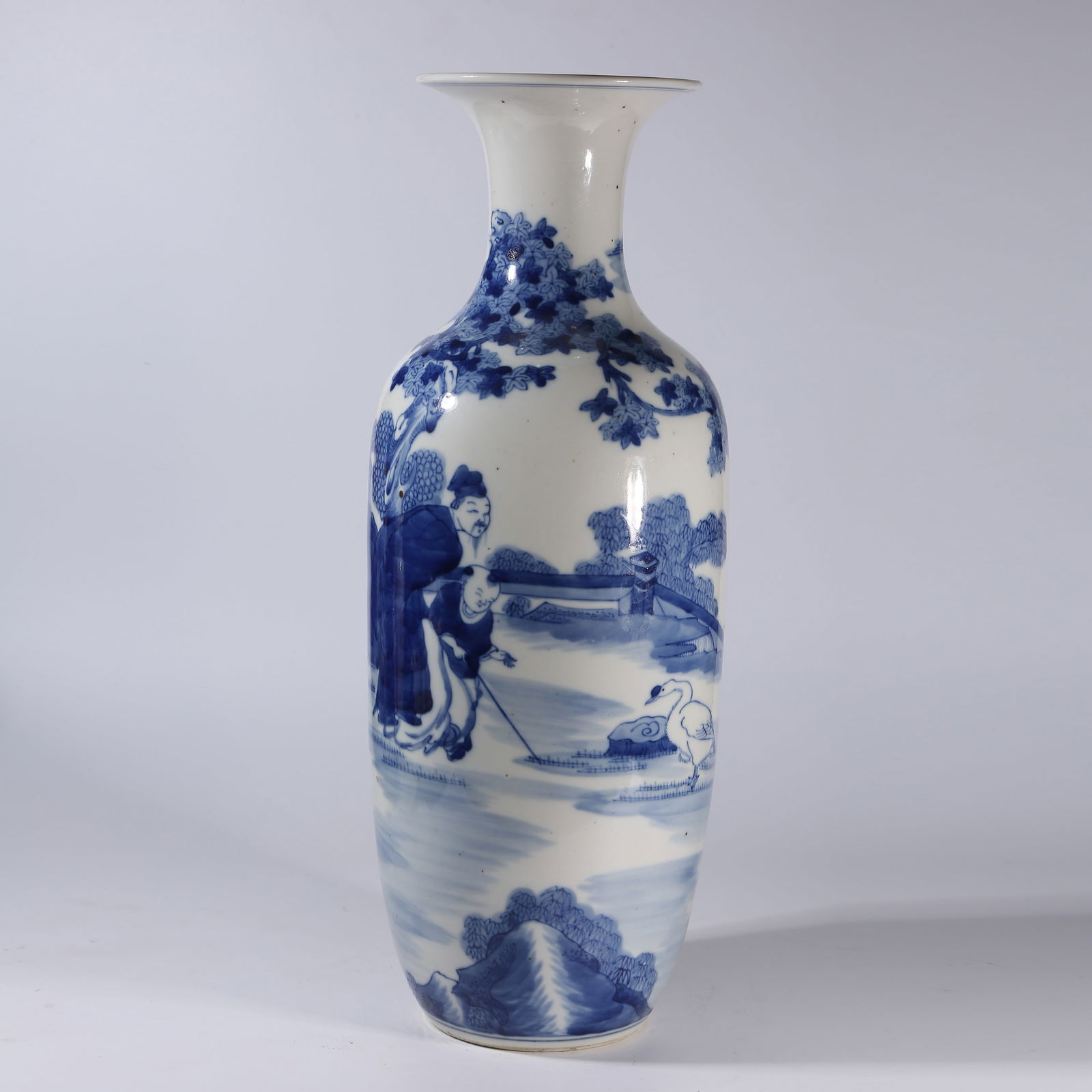 A BLUE-AND-WHITE SPOUTED BOTTLE WITH CHILD PLAYING WITH GOOSE MOTIF (1 of 10)