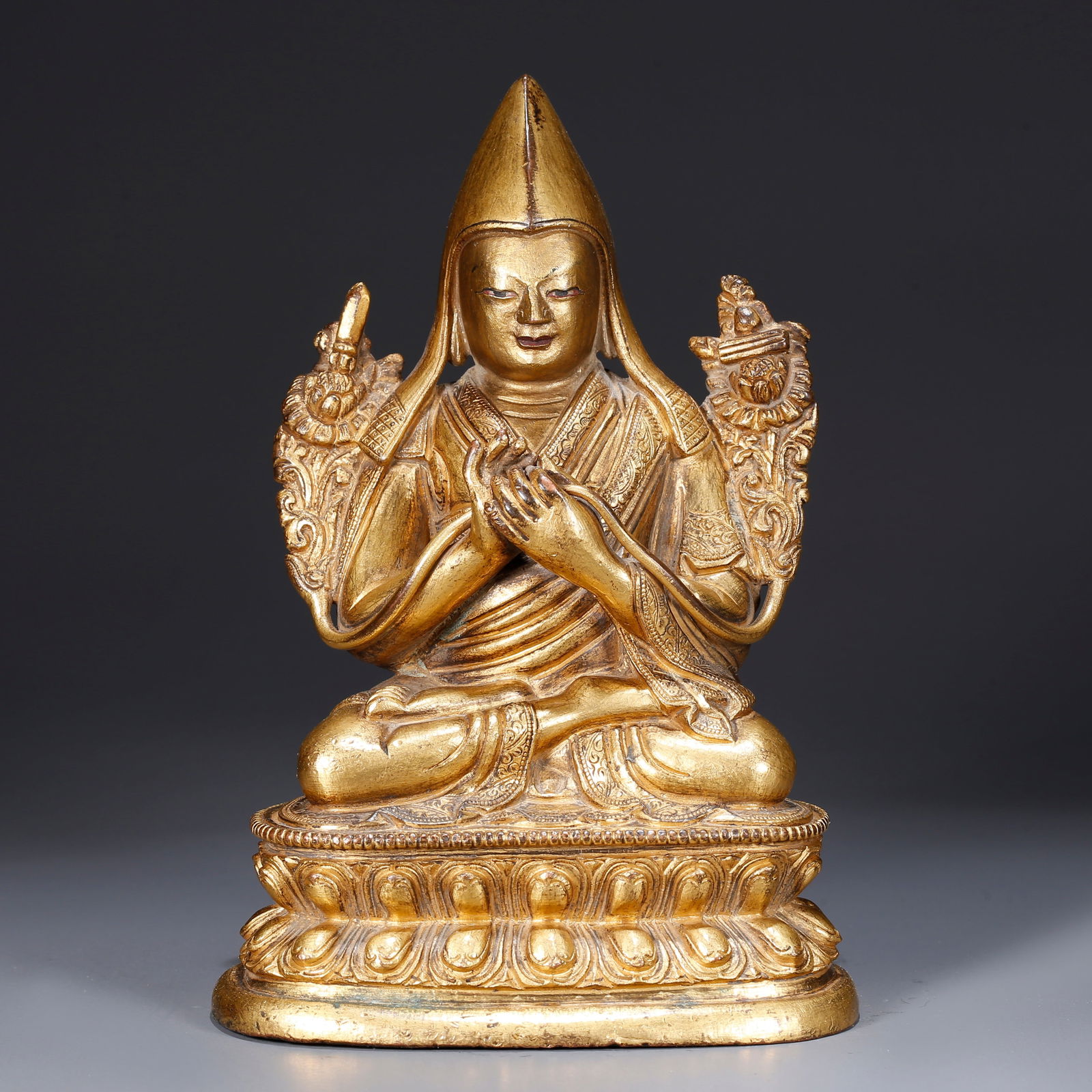 A GILDED BRONZE STATUE OF TSONGKHAPA (1 of 9)