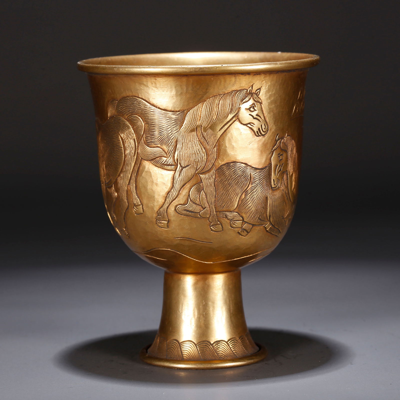 A GILT BRONZE CUP WITH FINE HORSE PATTERN (1 of 9)