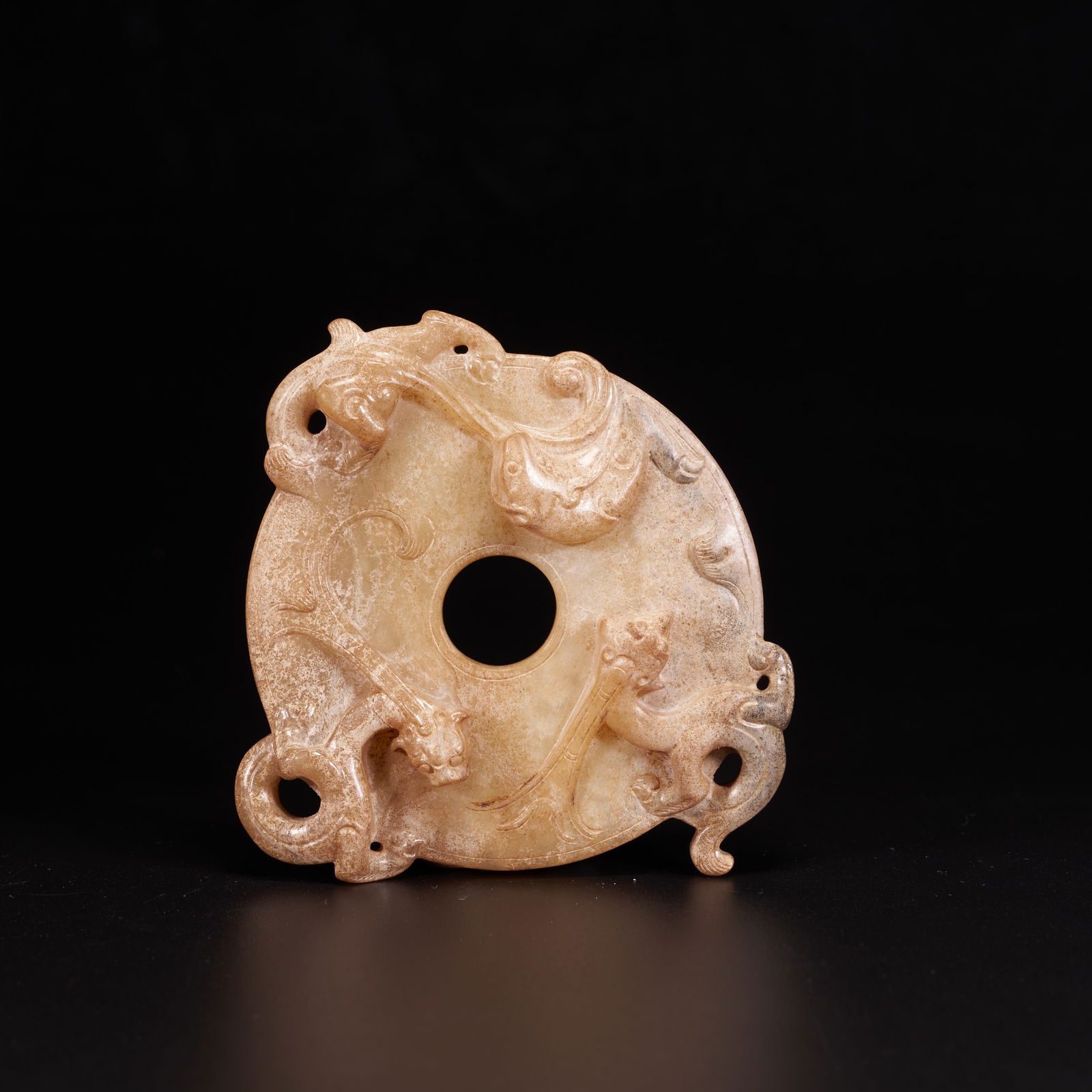 A HIGH-ANTIQUITY JADE RING WITH CHI-DRAGON MOTIFS (1 of 10)