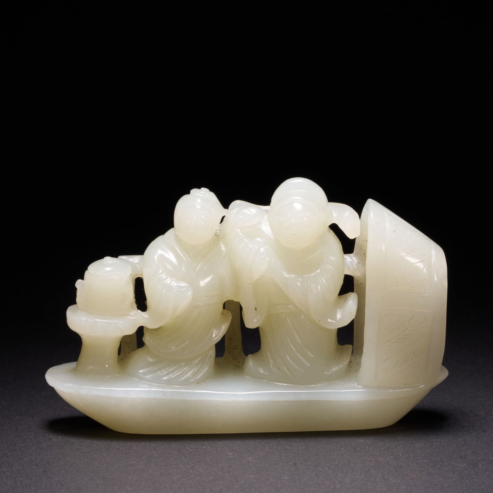 A HETIAN JADE "SHARING HARDSHIP AND HELP" (FENGYU TONGZHOU) ORNAMENT, QING DYNASTY (1 of 8)