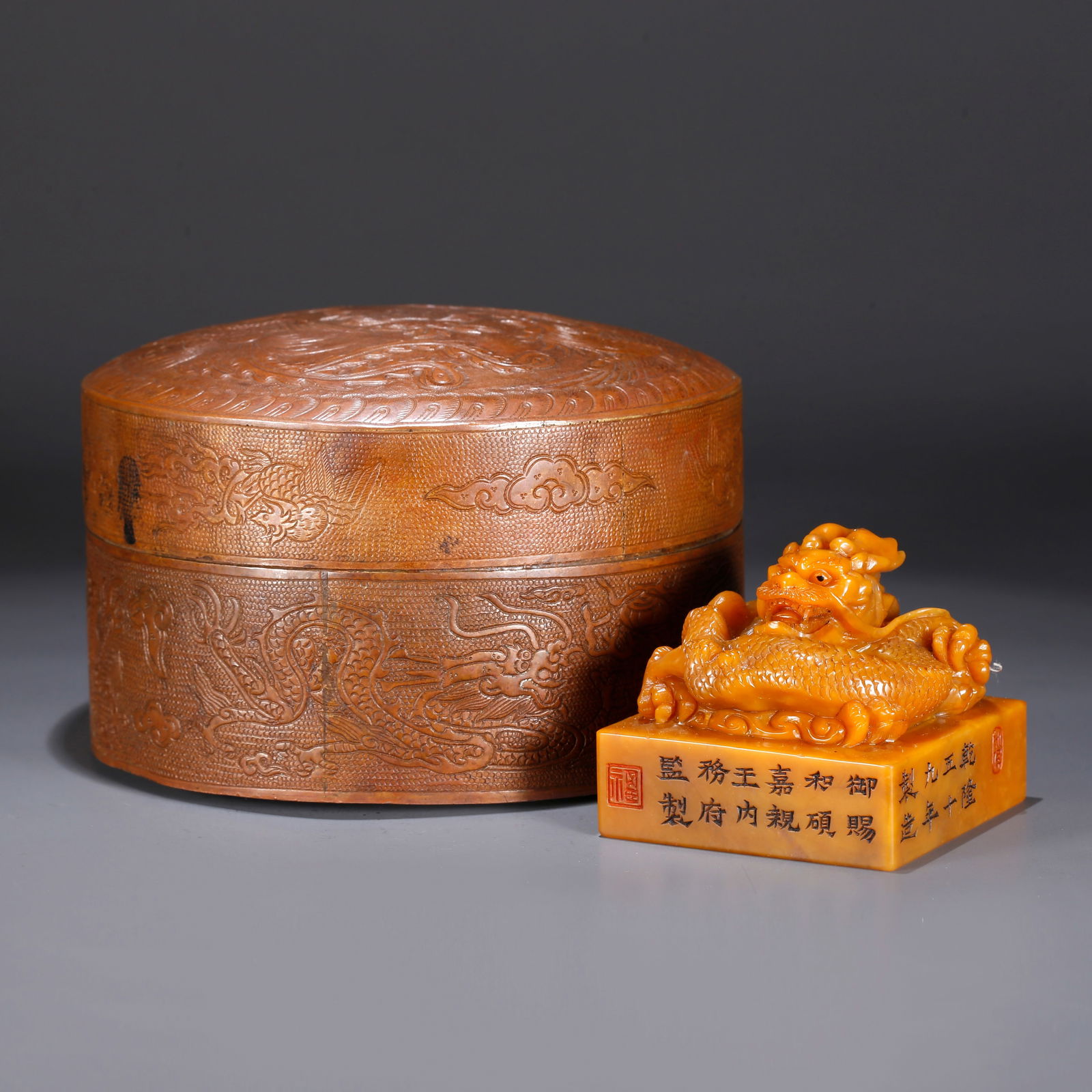 A SHOUSHAN TIANHUANG STONE SEAL WITH DRAGON KNOB: Shoushan Tianhuang stone seal with dragon knob